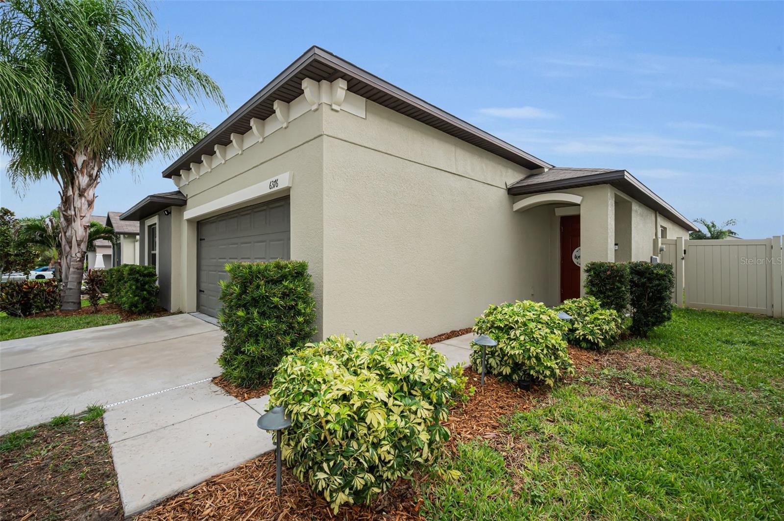 Better Than New in CopperSpring – Move-In Ready 2021 Lennar Home!

Why wait to build when you can own this beautifully maintained 2021-built Lennar home in the highly desirable CopperSpring community in New Port Richey? Offering 4 bedrooms, 2 bathrooms, and a 2-car garage, this modern home combines today's most sought-after design features with an unbeatable location and exceptional community amenities.

Step inside to a bright, open-concept floor plan filled with abundant natural light. The spacious kitchen is the heart of the home, featuring a large center island with seating, beautiful 42-inch wood cabinetry, a generous walk-in pantry, and seamless views of the living and dining areas - creating the perfect space for entertaining or everyday living.

Sliding glass doors open to your private, fully fenced backyard where you'll enjoy an extended paver patio and a large pergola, providing the ideal setting for weekend barbecues, outdoor dining, or simply relaxing after a long day.

The thoughtfully designed split-bedroom floor plan offers privacy for the spacious primary suite, complete with a large walk-in closet and an ensuite bath featuring dual vanities. Three additional bedrooms and a full bath provide plenty of room for family, guests, or a home office.

Life in CopperSpring offers more than just a beautiful home. Residents enjoy a community pool, playground, scenic walking trails, and a private kayak launch where you can explore the peaceful beauty of the Anclote River.

Conveniently located just off SR-54 with easy access to US-19 and the Suncoast Parkway, you're minutes from Trinity, Downtown New Port Richey, shopping, restaurants, medical facilities, parks, top-rated schools, theaters, and the beautiful Gulf beaches. Spend your evenings dining downtown, enjoying community events, or strolling along picturesque Sims Park on the Cotee River.

This is an exceptional opportunity to own a newer construction home in one of New Port Richey's most desirable master-planned communities. Schedule your private showing today and discover why CopperSpring is the perfect place to call home!