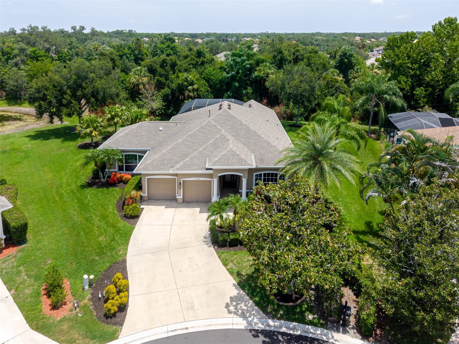 Welcome to your private oasis in the highly coveted, gated community of Greyhawk Landing!
Situated on a rare, oversized 12,088 sq ft estate lot, this pristine 3-bedroom PLUS a dedicated Den, 3-FULL bathroom home offers nearly double the yard space of standard neighborhood properties. Why settle for a basic 3-bedroom, 2-bath layout when you can have a spacious, custom configuration designed for modern living? Step inside to a beautifully maintained, carpet-free interior featuring gorgeous wood flooring and seamless tile throughout the main living areas and versatile den—perfect for a private home office, hybrid work, or a quiet reading room.
The heart of the home flows effortlessly into the main living spaces and features premium, upgraded KitchenAid appliances. The original cabinetry and durable Corian countertops are in immaculate condition, offering a clean, functional workspace or the perfect canvas to customize your dream culinary kitchen. Structurally expanded with a fully permitted bedroom and 3rd full bathroom addition in 2013, this unique layout offers incredible flexibility, extra privacy for guests, or an ideal multi-generational setup.
Slide open the doors to your backyard paradise. The massive, fully screened lanai surrounds a sparkling saltwater pool and spa, leaving plenty of extra green grass on your oversized lot for pets, play, or custom landscaping buffers.
* Pool & Spa Gas Heater: Replaced this year
* Water Heater: Replaced just 2 years ago
* Roof: Only 6 years old
* HVAC System: Replaced with a premium, built-in antimicrobial UV light system
* Garage Doors: Upgraded and replaced
* Flooring: Zero carpet—all wood and tile
Greyhawk Landing offers resort-style amenities including two community pools, a fitness center, tennis/pickleball courts, miles of walking trails, and top-rated Manatee County schools. Don't miss this rare opportunity to own a home with premium mechanics, and a massive lot that simply cannot be duplicated. Schedule your private showing today!