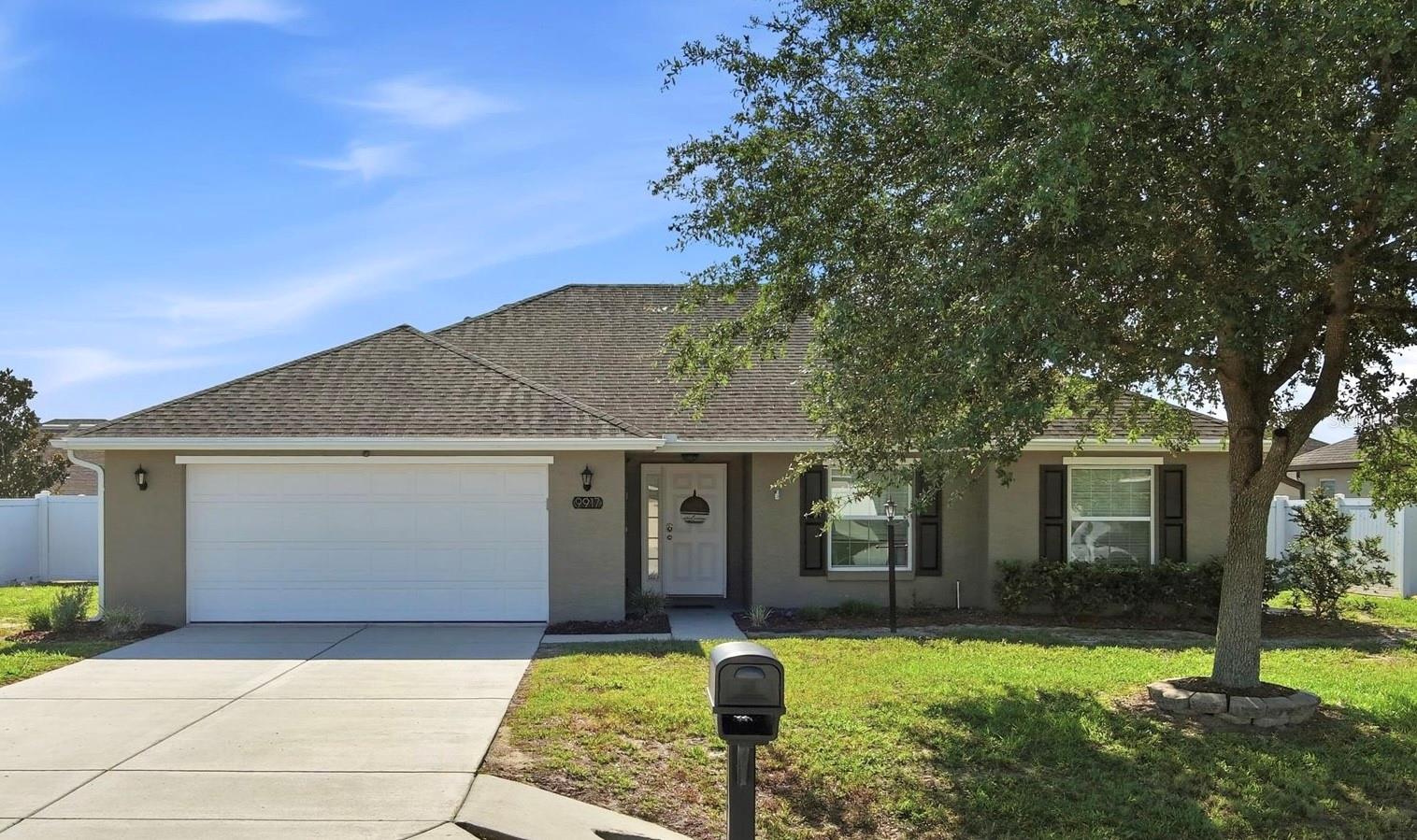 Beautifully maintained and move-in ready, this 3-bedroom, 2-bathroom home is located in the gated Meadow Glenn community of SW Ocala and offers the perfect blend of comfort, style, and functionality. Featuring a spacious open-concept floor plan, this home welcomes you with vaulted ceilings, abundant natural light, ceiling fans throughout, new luxury vinyl plank flooring in the main living areas, and brand-new carpet in the guest bedrooms. The well-appointed kitchen overlooks the living and dining areas and features granite countertops, a tile backsplash, stainless steel appliances, a breakfast bar island with sink, casual dining space, and an oversized walk-in pantry. A custom built-in cabinetry and display shelving feature adds both character and functionality to the living space. The spacious owner's suite offers a walk-in closet and an en-suite bathroom with dual sinks, granite vanity tops, an elongated toilet, and a tiled walk-in shower. Two generously sized guest bedrooms share a full bathroom with granite vanity tops and a tiled tub/shower combination. Additional interior features include a split-bedroom floor plan and an inside laundry room with utility sink and cabinetry. Recent improvements provide added peace of mind and include a freshly painted exterior, whole-home water filtration system, new garage door weather seals, new exterior water spigots, luxury vinyl plank flooring, carpeting in the guest bedrooms, and a newer dishwasher. Step outside to enjoy the fully fenced backyard, complete with a gazebo and storage shed, creating the perfect space for entertaining, gardening, pets, or simply relaxing outdoors. Additional exterior features include gutters and attractive curb appeal. Conveniently located near shopping, dining, medical facilities, and I-75, this beautifully maintained home offers a wonderful opportunity to enjoy comfortable Florida living in a desirable gated community.