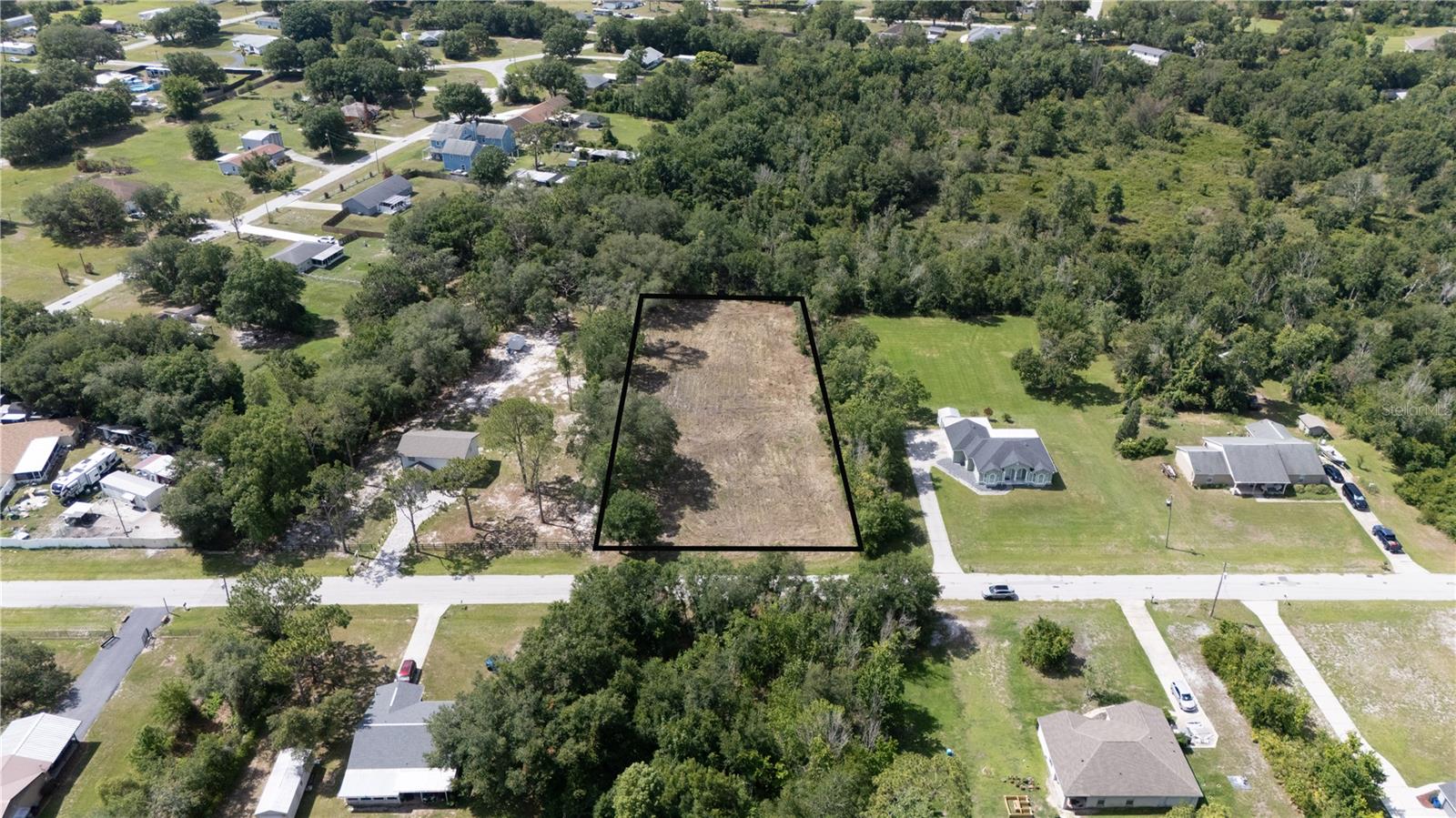 Look no further, your custom home belongs here! Measuring 150' x 290', this cleared 1 acre Fox Ridge homesite has no HOA fee, zoning that allows horses, and it is set in an established neighborhood known for its winding roads, spacious homesites, mature trees, and convenient location. With the land already cleared, the next owner can start with a true sense of possibility. Picture this- a cozy front porch, a home built the way you want it, and plenty of room left over for outdoor Florida living. Fox Ridge keeps you close to all of the local amenities, with Zephyrhills, Wesley Chapel, The Shops at Wiregrass, restaurants, shopping, and major roadways just minutes away. If you have been looking for well located property, this 1 acre homesite is worth a closer look. Call today for more information!