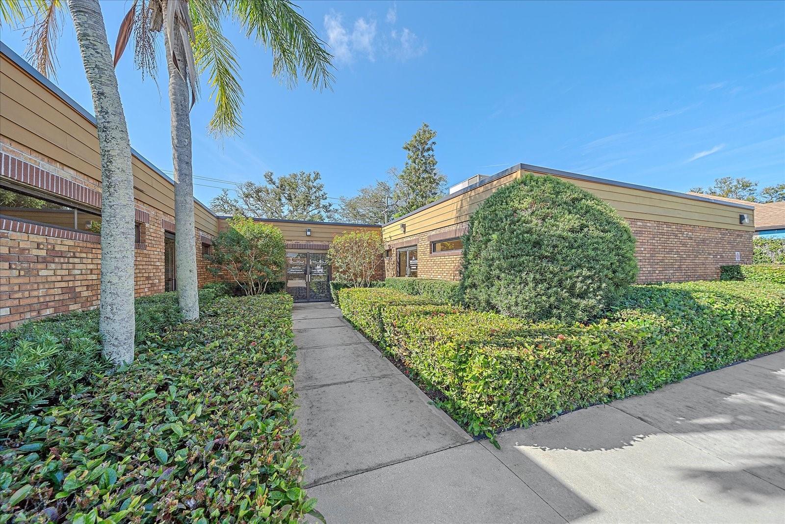 Professional, End Unit Office Condominium Unit located on Tamiami Trail in Venice with exposure to over 45,500 vehicles per day. Suite could be used for General Office and features a storefront entrance into a reception/waiting room, administrative office, 5 private offices/treatment rooms, 2 private restrooms and plenty of storage. Previous use was a medical office and each treatment room features cabinetry and counters with sinks. Located on high-visibility S. Tamiami Trail (US-41) in Venice, this office unit offers excellent exposure and easy access to I-75, Center Road, and Downtown Venice. Surrounded by professional offices, medical users, retail services, and dense residential neighborhoods, the location supports strong daily traffic and long-term demand for office users.