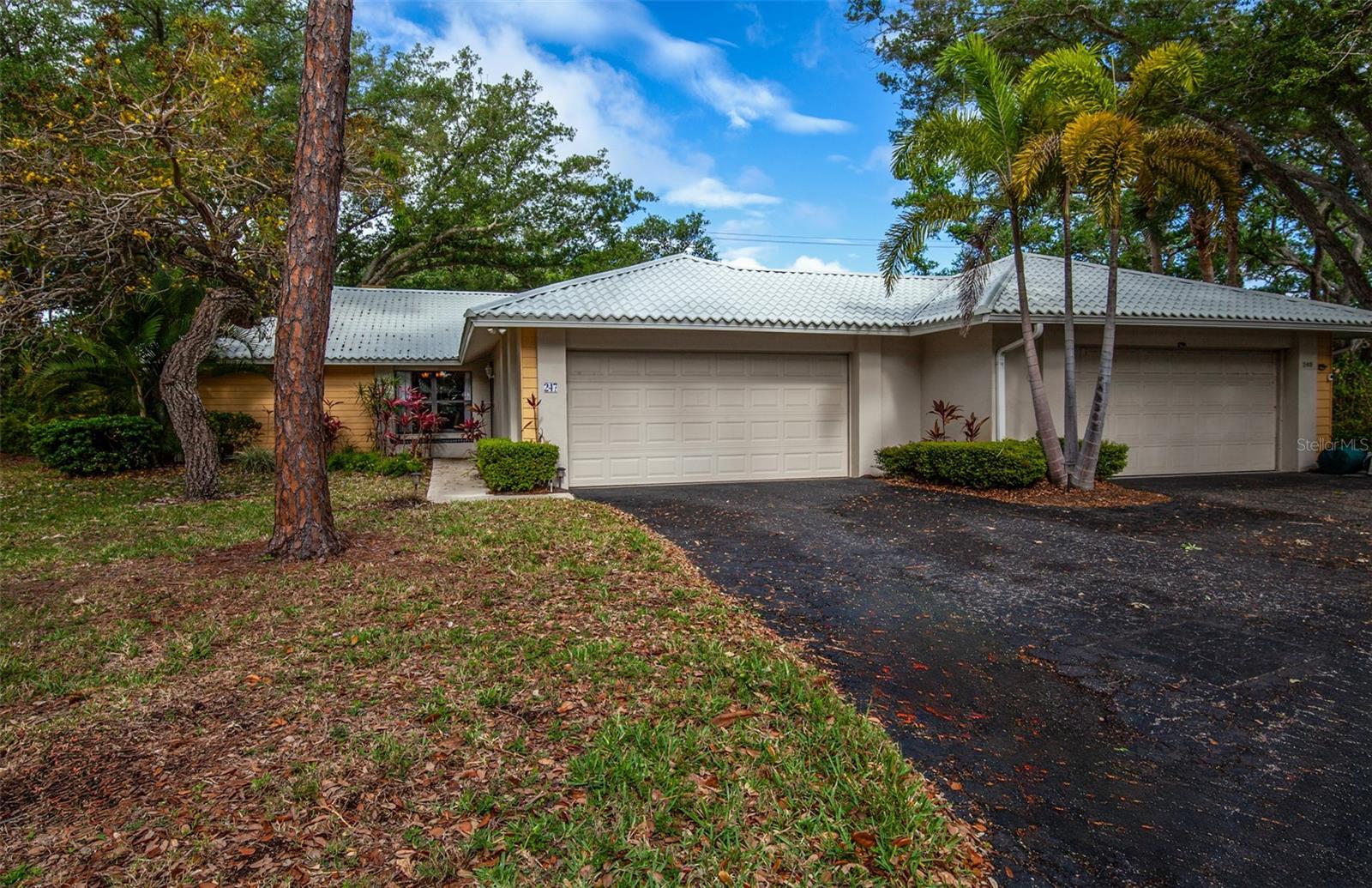 JUST LISTED | NEW ROOF | PRIVATE COURTYARD OASIS IN MYRTLE TRACE. Welcome to Paradise, a beautifully updated, move-in-ready villa tucked away on a peaceful cul-de-sac beneath a canopy of mature trees in the highly sought-after Myrtle Trace community of Plantation Golf & Country Club. From the moment you arrive, you will feel the tranquility, charm, and that unmistakable “this is the one” feeling. Step through the front door into a light-filled interior where soaring cathedral ceilings and a fresh, neutral palette create an open, airy elegance that instantly feels like home. Designed for Living & Entertaining this home offers two spacious living areas, including a sun-drenched Florida room overlooking lush tropical landscaping—perfect for morning coffee, afternoon reading, or hosting unforgettable gatherings. The inviting great room features a cozy fireplace, adding warmth and character on those rare cool Florida evenings. The kitchen is both stylish and functional, featuring: Shaker-style cabinetry, generous counter space, pantry storage, raised breakfast bar, and adjacent dining space. Your Private Retreat features the primary suite is thoughtfully positioned for privacy and relaxation, offering a peaceful escape at the end of the day. The en-suite bath includes a spacious vanity, walk-in shower, and separate water closet. Guests will feel right at home in the secondary bedroom, complete with sliding doors that open to the Courtyard , a perfect blend of indoor-outdoor Florida living and perfect for entertaining or a serene retreat for you! The lanai (fondly known as the “Jungle Room”) and dinette feature remote-controlled blinds, giving you effortless control of light and privacy. Updates have been done for Peace of Mind with a NEW ROOF (2026!), AC System & Electrical Panel (2020), and an Oversized 2-car garage. Here’s what truly sets this home apart! This villa has weathered two major hurricanes in recent years without any issues peace of mind that’s hard to find. Myrtle Trace is more than a neighborhood, it is a Lifestyle! 
Tree-lined streets, a peaceful atmosphere, and a welcoming, active community make this one of the area’s hidden gems. You and Your Family will the  Heated Community Pool, Clubhouse with Kitchen, Grill Area, Meeting Room & Lending Library creating a Vibrant Social Calendar. Optional membership to Plantation Golf & Country Club includes, Two Championship 18-hole golf courses, Tennis & Pickleball courts, Fitness center, Dining, Jr. Olympic Pool, and Location, Location, Location. Just minutes from shopping, dining, medical facilities, Wellen Park home of Atlanta Braves spring training facility, stunning Gulf Coast beaches, and Historic Downtown Venice. This is more than a home, it’s your everyday escape, whether you’re looking for a full-time residence or a seasonal retreat, this villa delivers comfort, charm, and the Florida lifestyle. Schedule your private showing today—homes like this in Myrtle Trace don’t last!