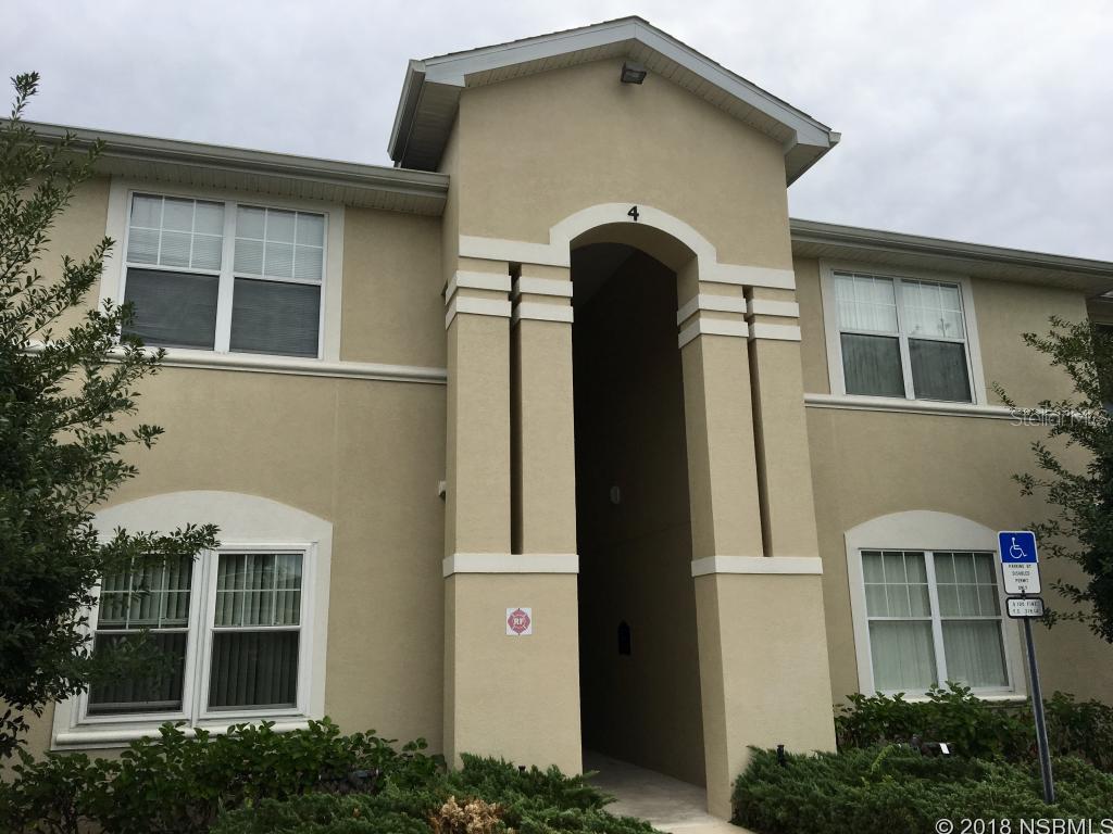 Move-in-ready 2nd floor lake view condo located in desirable Port Orange! This unit features; 2 bedrooms and 2 baths with a split floor plan for privacy. Both bedrooms have volume ceilings & large walk-in closets. Master closet features built-in shelving. The main living area has new neutral colored wall to wall carpet that will fit any decor. The kitchen offers ample cabinetry, full stainless steel appliance package and breakfast bar. Laundry room comes complete with washer and dryer. This unit is only a short walk to the community pool and clubhouse. The low maintenance fee of $305 covers, basic cable, pest control, water, sewer and trash. You also are assigned a deeded covered parking space for your convenience. Come see this wonderful unit before it's gone! ;LocationDescription: Condo ;Water: City