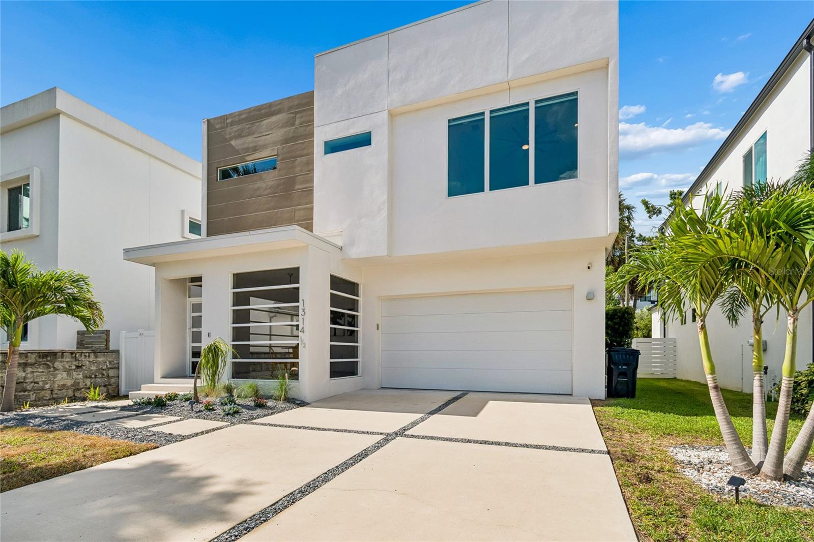 I am excited to share a rare opportunity to own a unique, custom-built home in the heart of Tampa’s iconic Lemon Street (33606).
Known as "The Walter," this stunning two-story modern residence was built in 2020 and features architectural influences inspired by Frank Lloyd Wright. This four-bedroom, three-bathroom home offers a perfect blend of indoor and outdoor living, starting with a large, screened-in front porch oasis. Inside, the open-concept floor plan is highlighted by vaulted ceilings, large windows with abundant natural light, and upgraded tile flooring. The designer kitchen is equipped with luxury quartz countertops, high-end cabinets with European hardware, and a unique porcelain backsplash.
For added flexibility, the home includes a main-floor flex space that serves as a fourth bedroom or office with an en-suite bath. Upstairs, you will find a bonus media area and a master suite featuring a double vanity, a private bathroom, and a dedicated room for a custom wardrobe. The backyard is a private retreat featuring a heated saltwater pool, low-maintenance landscaping, and a timed sprinkler system. Additionally, the home is fully equipped with Google Wi-Fi Pro to manage smart features remotely.
The location is unbeatable: just three minutes from downtown Tampa, you can easily access the convention center via water taxi for games and concerts, or bike along the Riverwalk to Water Street and Sparkman’s Wharf. Soho Village, Hyde Park, and the beautiful Bayshore Boulevard are all within two miles, putting the best theaters, museums, and dining at your fingertips.
This truly one-of-a-kind property perfectly captures the Florida lifestyle and won’t last long. Contact me to set your appointment today.
