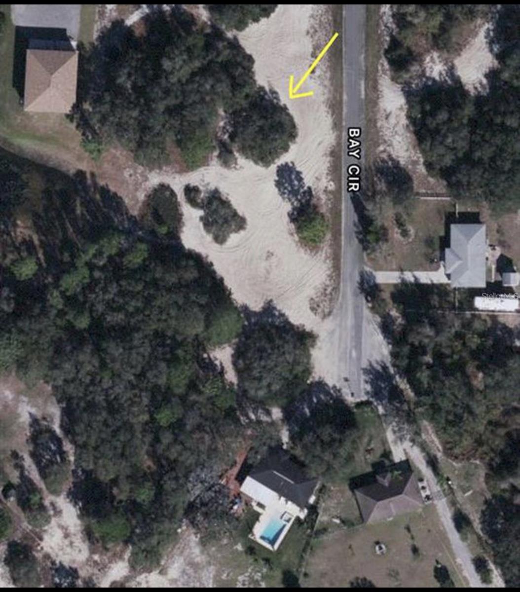 Walking-In-Water Lake is a well-stablished community were you can enjoy the tranquility and have your boats in your backyard. It is a walking distance from Lake Wells and the lot is not in a flood zone. This lot is .59 and is almost clean with few trees in it. Water and electricity are already in the community for you to just install it in your home. This is a place that you can build your dream home and have your toys/boats. This is not just a vacant land, it is a single family community.