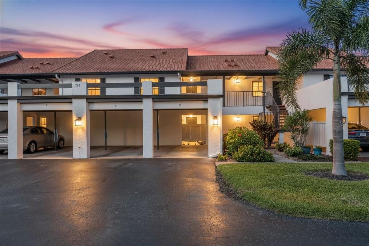 Highly sought after Capri Isles leads you to this amazing second floor condo in Estancia WITH A BRAND NEW ROOF! Estancia is a wonderful community with friendly neighbors, well maintained grounds, a great clubhouse, beautiful pool and a public golf course across the street making this a great lifestyle.  Inside you will find an open floor plan and pleasant neutral decor. Ceramic tile floors throughout the condo. An appealing kitchen with nice workspace on the stunning granite counters, tile backsplash, plenty of cabinet space and comes with appliances. Open living room flows with the dining room for easy entertaining.  You will love the updated primary bath with new cabinetry, granite counters, lighting and mirrors.  The second bath room has also received updates.  Sliders from the primary bedroom and the living room lead to the large lanai!  Washer and dryer inside the condo, good storage space and a carport. The reasonable condo fee includes water, cable, internet and much more! The location is amazing with easy access to pristine beaches, renowned dining establishments, shopping centers and close to Sarasota Memorial.  Whether you are an avid golfer, nature enthusiast or simply seeking a tranquil haven to call home, this condo will appeal to you!  This is a large condo for under 200K in a beautiful community making it a BEST BUY!