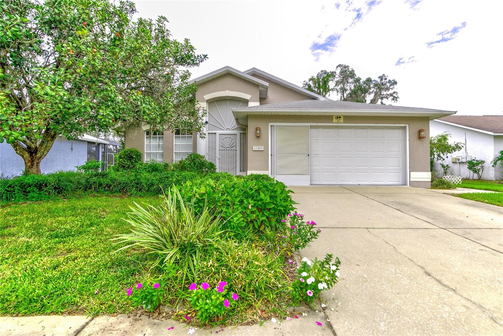 BACKUP OFFERS ARE WELCOMED  How would you like a new roof at closing? This seller is open to price negotiations to provide a healthy reduction and/or new roof to replace the one that has reached its end of life. Current roof has solar panels which seller does NOT plan to replace. You're going to love it here. Wow. The community of Meadow Oaks is highly desired due to its great location and proximity to both New Port Richey and the Suncoast Parkway - Veterans Express. The entrance through the community leads you through winding roads with deer crossings, golf course and natural lake views. The architecture is modern and airy, with a lovely split 3 Bedroom 2 Bathroom floorplan that leads to a beautiful POOL area with much space for gatherings. New HVAC unit is about one year old. It's light and bright with high ceilings, and a Sky Light! There is so much to love in the house and in the community of Meadow Oaks for such a low HOA fee ($48 per month) that includes clubhouse, pool, tennis, basketball, weight room, billiards, and social events.  All this plus a golf course setting, too.  Come see it and bring forth an offer!