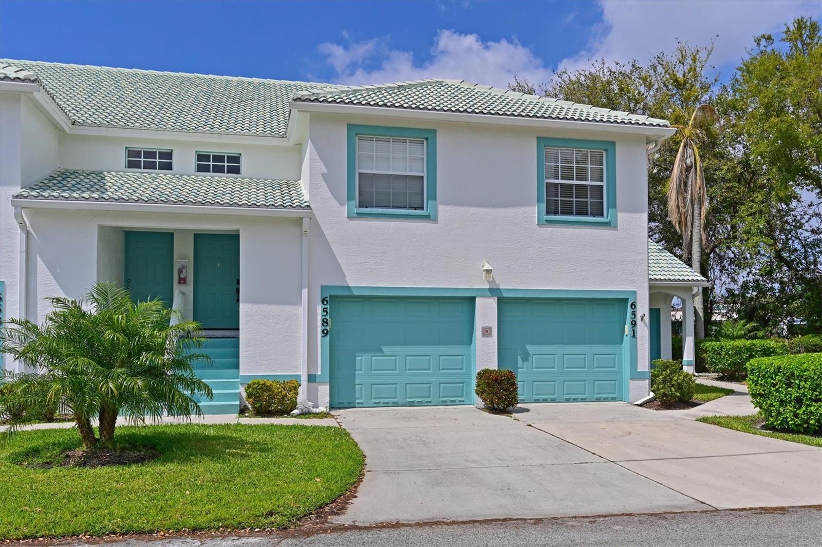Welcome to this beautifully maintained, turnkey-furnished condo offering easy Florida living in a prime location. The first floor features a private one-car garage, while the main living area is located on the second floor, providing a spacious and comfortable layout. This home offers 2 bedrooms, 2 bathrooms, and a versatile office/den that can be used as a home office, reading room, or additional space for guests. The updated kitchen features soft-close cabinets and drawers and opens to the family room, creating a comfortable space for everyday living and entertaining. One of the standout features is the large covered and screened lanai, perfect for enjoying your morning coffee, relaxing with a good book, or dining outdoors year-round. Recent improvements include a new A/C installed in February 2026 and a new roof (2026), giving buyers added peace of mind. Golf membership is available but not required, allowing you to enjoy the community without mandatory golf fees. Conveniently located near I-75, you'll have easy access to Sarasota, St. Petersburg, Tampa, Gulf beaches, shopping, restaurants, and everyday conveniences. Being sold turnkey furnished, this home is ready for you to move in and start enjoying everything the Florida lifestyle has to offer.