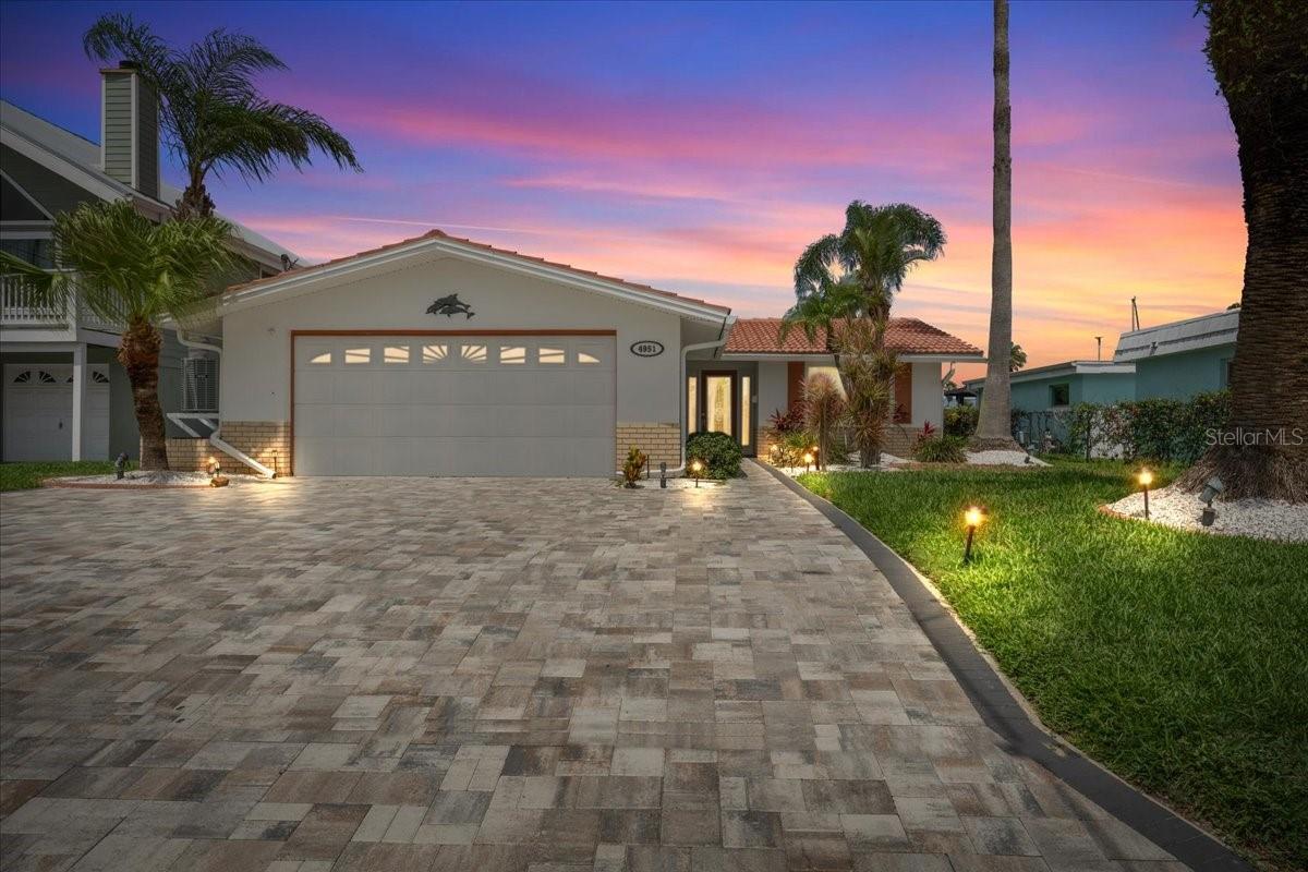 Experience the ultimate Florida waterfront lifestyle in this fully remodeled coastal retreat in beautiful New Port Richey. Designed for both relaxation and entertaining, this move-in-ready property features stylish updates throughout with a fresh, modern feel from top to bottom.
Step outside to enjoy brand new pavers creating the perfect backyard oasis along the water. Boating enthusiasts will appreciate the private boat dock, deep water access with no bridge restrictions, and easy access to local sandbars and Anclote Island right from your backyard. An assumable flood policy at just $2,325 annually adds even more value and peace of mind.Located in a golf cart-friendly neighborhood, residents enjoy access to two private boat ramps, a civic association, and a private beach club that hosts many community events throughout the year. Plus, you’re just a short distance from the charming shops, restaurants, and entertainment of downtown New Port Richey.Whether you’re searching for a full-time waterfront residence, vacation getaway, or investment opportunity, this beautifully updated home offers the perfect combination of comfort, convenience, and coastal living.