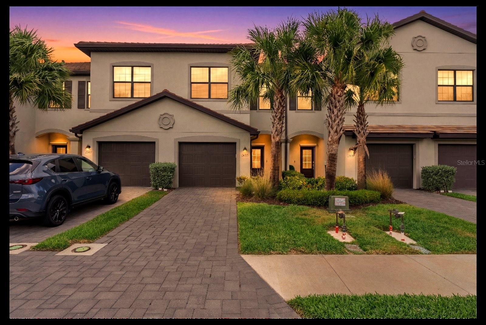 Virtually Staged. Welcome to your dream lifestyle in the heart of Lakewood Ranch! This stunning two-story townhome perfectly captures the essence of Florida living with a serene water view that greets you the moment you step toward your screened lanai. The main floor features a seamless kitchen and living room combination, creating an inviting open-concept space perfect for hosting friends or enjoying quiet evenings at home. Upstairs, you will find a thoughtful layout where all three bedrooms reside, offering a private retreat from the main living areas. This home also includes a convenient one-car garage equipped with an automatic opener for effortless coming and going.

The surrounding community is truly a recreational paradise, anchored by a full-time lifestyle director who curates a diverse calendar of events and activities for residents of all ages. Residents enjoy world-class amenities including a sparkling lap lane pool, hot tub, kid splash pad, resort style pool, a social poolside bar and restaurant for weekend relaxation, a putting green, and a state-of-the-art fitness center and aerobics room that even houses an indoor basketball / volleyball court, A childrens play room and arcade.  If you enjoy staying active outdoors, you will love the onsite tennis, pickleball, and beach volleyball courts, while the playground and recreational facilities provide endless fun for everyone.

Perfectly situated with easy access to the premier shopping, dining, and entertainment that Lakewood Ranch is famous for, this property represents a remarkable opportunity to live the life you have always imagined. Whether you are enjoying the peaceful water vistas from your back porch or participating in a community social, every day here feels like a vacation. Schedule your private showing today and discover your new home in paradise!