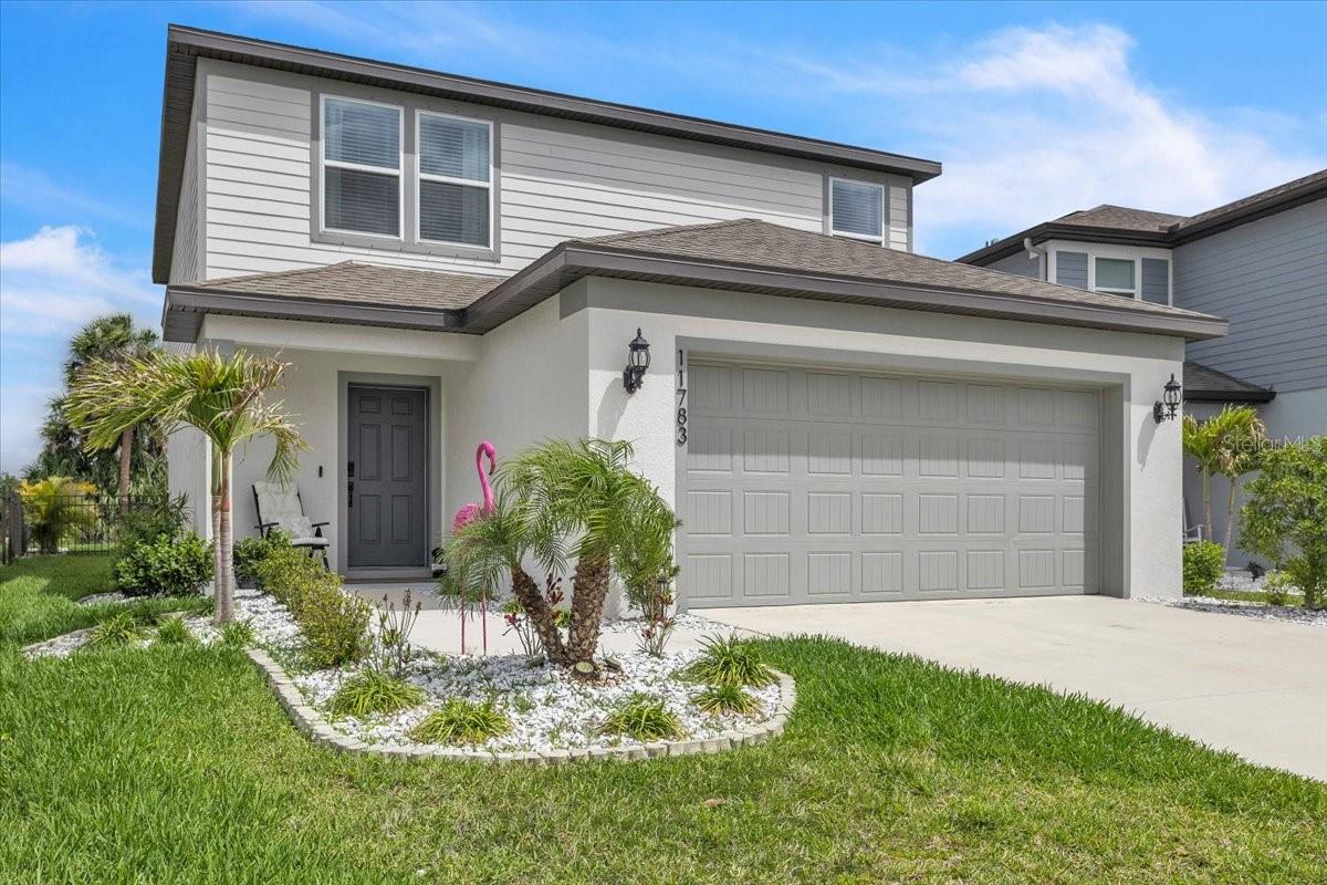 TURNKEY FURNISHED—Just Bring Your Suitcase! Experience the perfect blend of style, comfort, and privacy in this beautifully upgraded 4-bedroom, 3-bath home located in the highly sought-after Isles at BayView in Parrish. Situated on a premium preserve homesite, this meticulously maintained, two-year-old residence offers over 2,200 square feet of thoughtfully designed living space with exceptional upgrades throughout.
Designed with both functionality and entertaining in mind, the open-concept floor plan features a desirable first-floor bedroom and full bath—ideal for guests, multigenerational living, or a private home office. The spacious kitchen overlooks the dining and living areas, creating a bright, welcoming space perfect for everyday living and gathering with family and friends.
This home showcases numerous custom upgrades rarely found in builder-grade homes, including elegant crown molding, chair rail detailing, picture frame molding, upgraded lighting, designer ceiling fans, and updated hardware throughout the kitchen and bathrooms. A beautifully redesigned staircase enhances the open feel of the home, while glass French doors at the pantry and bar area add both elegance and functionality.
Upstairs, a generous loft provides flexible living space that can serve as a media room, game room, second family room, or playroom. A custom feature wall creates a stylish focal point, while the second floor also offers two spacious guest bedrooms, a full bath, a conveniently located laundry room, and a private owner's retreat featuring a spacious bedroom, walk-in closet, and en-suite bath.
Step outside and enjoy your own private backyard oasis. The extended screened lanai and oversized paver patio overlook a tranquil preserve, providing the perfect setting for morning coffee, outdoor dining, entertaining, or simply relaxing while enjoying peaceful Florida sunsets. Enhanced landscaping and decorative white stone accents create outstanding curb appeal and complete the home's polished exterior.
Residents of Isles at BayView enjoy resort-style amenities including a clubhouse, community pool, playground, dog park, and scenic walking paths. Conveniently located just minutes from I-75 and Moccasin Wallow Road, you'll enjoy easy access to shopping, dining, medical facilities, golf courses, Gulf Coast beaches, Sarasota, St. Petersburg, Tampa, and Lakewood Ranch.
With premium upgrades, a desirable preserve lot, flexible floor plan, and true turnkey convenience, this exceptional home is move-in ready and offers an incredible opportunity to enjoy the very best of Florida living.