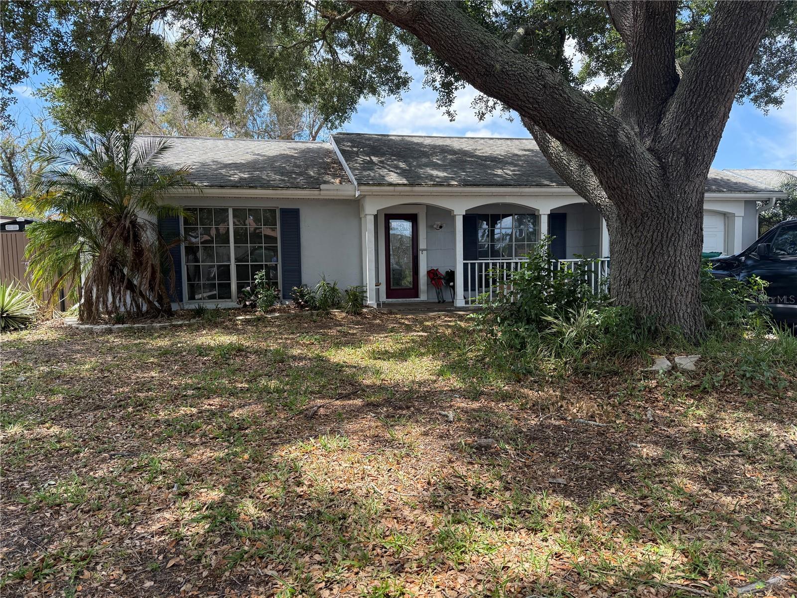 Priced to sell fast. 

2-bed, 2-bath home in Holiday with all major systems updated. 

New AC system and full ductwork replacement in July 2025. Roof and water heater replaced in 2018. Epoxy flooring installed June 2025. Home needs light cosmetic improvements. One-car garage. Two exterior sheds for storage. No HOA. Close to Tarpon Springs, Gulf beaches, shopping, and major roads.