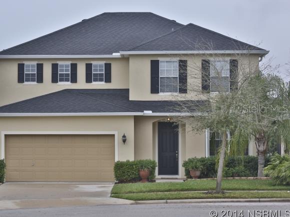 ELEGANCE & COMFORT IN THIS 3-BEDROOM 2.5 BATH 2-STORY LAKEFRONT HOME WITH MANY UPGRADES! IMPRESSIVE TILED ENTRY INTO FORMAL LIVING & DINING ROOM BOASTING TEN FT. CEILING & STUNNING TOP QUALITY LAMINATE CHERRY WOOD-LIKE FLOORING. OPEN FAMILY ROOM WITH ELECTRIC FIREPLACE ACCENTED BY TRAVERTINE & GLASS MANTEL. GOURMET LOVERS KITCHEN FEATURING GRANITE COUNTER TOPS, OVER SIZED CUSTOM MAPLE WOOD CABINETRY - CROWN TOPPED WITH CHERRY & LIGHT WOOD MOLDING, TRAVERTINE TILE BACK SPLASH, EXTENDED ISLAND/BREAKFAST BAR...GE STAINLESS STEEL APPLIANCES INCLUDING: DOUBLE OVEN/STOVE, MICROWAVE, DISHWASHER & SEPARATE ICE MACHINE! LARGE PANTRY & EXTRA UNDER STAIRWELL STORAGE CLOSET. INSIDE LAUNDRY OFF 2-CAR GARAGE... STORAGE CLOSET & GUEST BATHROOM WITH DESIGNER PAINT. EAT-IN-KITCHEN DINING AREA WITH SLIDER ACCESS TO SCREENED IN PORCH OVERLOOKING LAKE AND BEAUTIFUL VIEWS. SECOND FLOOR FEATURES LARGE MASTER SUITE AND MASTER BATH WITH LARGE WALK-IN CLOSET...MARBLE-TOP DOUBLE VANITY...SOAKER TUB...SEPARATE TUB AND PRIVATE WATER CLOSET. TWO BEDROOMS W/FULL BATH... PLUS LARGE LOFT AREA OR 4TH BEDROOM/MEDIA ROOM/KIDS PLAY ROOM - MANY OPTIONS! HOME ALSO FEATURES: CUSTOM WINDOW TREATMENTS IN GREAT ROOM, CEILING FANS & UPGRADED LIGHTING THROUGHOUT, THERMAL PANED WINDOWS, 6" SEAMLESS GUTTERS, 25-YR ARCHITECTURAL SHINGLES...HURRICANE SHUTTERS...RECLAIMED WATER SPRINKLER SYSTEM & WIRELESS SECURITY SYSTEM (Needs hook-up) SITUATED ON CUL-DE-SAC WITH COMMUNITY POOL, FITNESS TRAILS & PRIVATE PARK ;Water: City