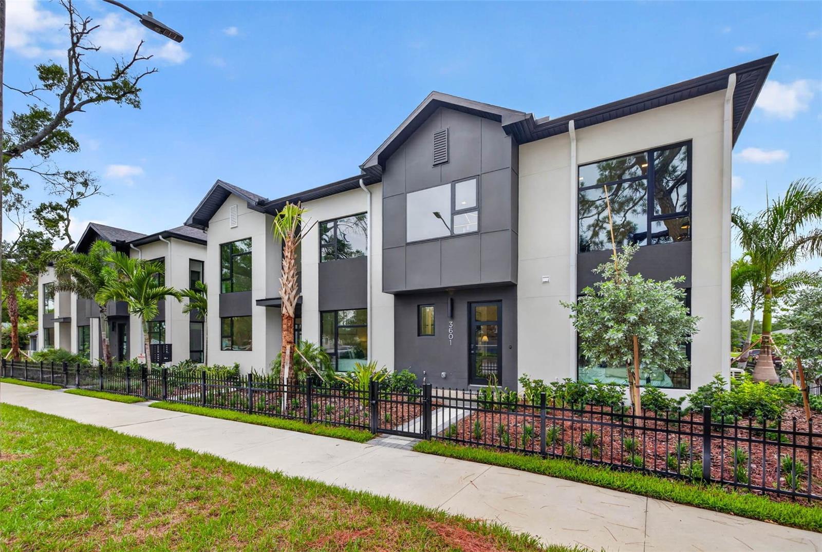 FIRST SALE INCENTIVE - $30,000 IN BUILDER FLEX CASH! Introducing The Gallery at The Junction, a residence where architecture and lifestyle come together in perfect harmony. Situated within an exclusive collection of only 10 newly constructed design-forward townhomes, this all-block masterpiece embodies contemporary elegance in one of St. Petersburg's fastest appreciating neighborhoods. Inspired by the sophistication of a curated gallery, the residence showcases dramatic ceiling heights, expansive walls of glass, and interiors filled with natural light that elevate everyday living into an experience. The thoughtfully designed floor plan creates a seamless flow between entertaining spaces and private retreats, while refined finishes and meticulous craftsmanship establish an atmosphere of comfort. Anchored by a beautifully landscaped central courtyard, The Junction offers a unique sense of community and privacy, all while remaining moments from downtown St. Petersburg's vibrant culinary scene, award-winning waterfront parks, and thriving arts district. The inclusion of a private EV charger hookup further enhances the home's forward-thinking design and convenience. As an added incentive, buyers may take advantage of the $30,000 flex cash offering to customize their residence through upgraded appliances, designer window treatments, custom closet systems, closing cost assistance, or an interest rate buy-down. The Gallery is more than a home—it is an invitation to experience modern luxury in one of Tampa Bay's most exciting emerging destinations. Call today for your private showing!