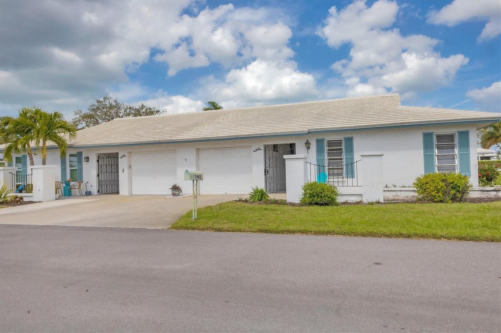 Charming! Tucked in the heart of Village Green, one of Bradenton's most sought-after 55+ communities, this spacious 2-bedroom, 2-bathroom end unit is sure to steal your heart. As you stroll through this inviting condo, you'll appreciate the open layout, beginning with the living and dining room combination that flows seamlessly into the expansive Florida room—an extension of the home with sliding glass pocket doors that allow for effortless indoor-outdoor living.
Open the windows and let the refreshing breeze in as you gaze out onto your large backyard, just steps from the heated community pool. Whether enjoying a quiet morning or relaxing in the evening, the peaceful surroundings make for the perfect backdrop. The separate dinette area is ideal for quaint dinners or sipping coffee while taking in the view through the sliding glass doors.
The kitchen and bathrooms have been beautifully renovated with modern finishes, while still retaining the home’s original charm. Low-maintenance flooring throughout makes for easy upkeep. The quiet street ends in a cul-de-sac, ensuring no busy cut-through traffic and creating a serene environment.
With ample storage space, this condo is move-in ready—simply pack up your house and make Village Green your new home. Located just a short distance from the stunning beaches of Anna Maria Island, this property offers the perfect balance of peaceful retreat and convenience to everything you need.