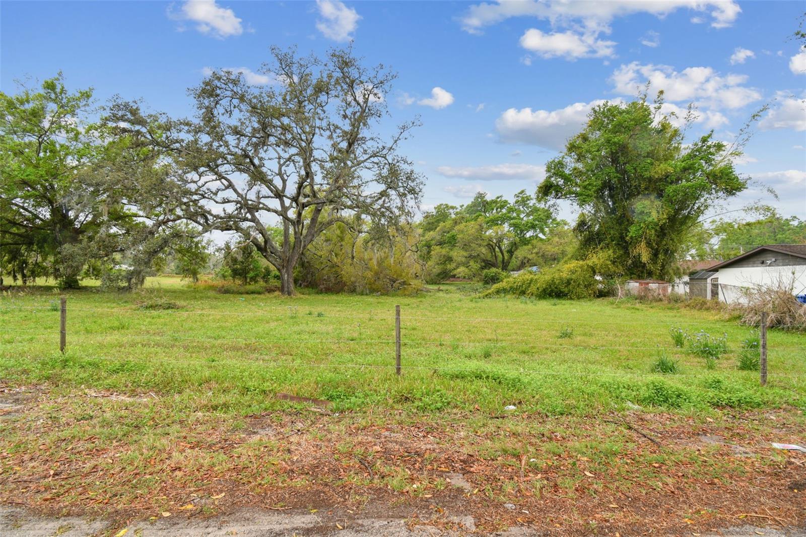 This is your chance to own 2.4 acres of prime vacant land in Seffner, one of Hillsborough County’s fastest-growing communities. Located in an unincorporated area poised for expansion, this property offers an incredible opportunity for builders, developers, and visionaries looking to invest in a location that seamlessly blends modern convenience with the tranquility of country living.

With easy access to I-4 and I-75, commuting to Tampa, Brandon, Plant City, and Orlando is effortless. The surrounding area is experiencing rapid growth, with new residential communities and commercial developments emerging, including an Amazon fulfillment center just down the road. Zoned RDC-6 (Residential Duplex Conventional), this versatile property allows for up to six units per acre, making it perfect for a multi-family development or a spacious private estate.

High and dry in Flood Zone X, this land requires no flood insurance, adding even more value to its appeal. It is just minutes from shopping, dining, entertainment, parks, and only a 20-minute drive to the University of South Florida (USF), offering the perfect balance of urban convenience and rural charm.

Seffner is known for its peaceful surroundings while still being close to major business centers and daily necessities. Whether you’re looking to develop, invest, or create a private retreat, this exceptional property provides endless possibilities in a thriving market.

Don’t miss out on this rare opportunity—contact us today for more details!