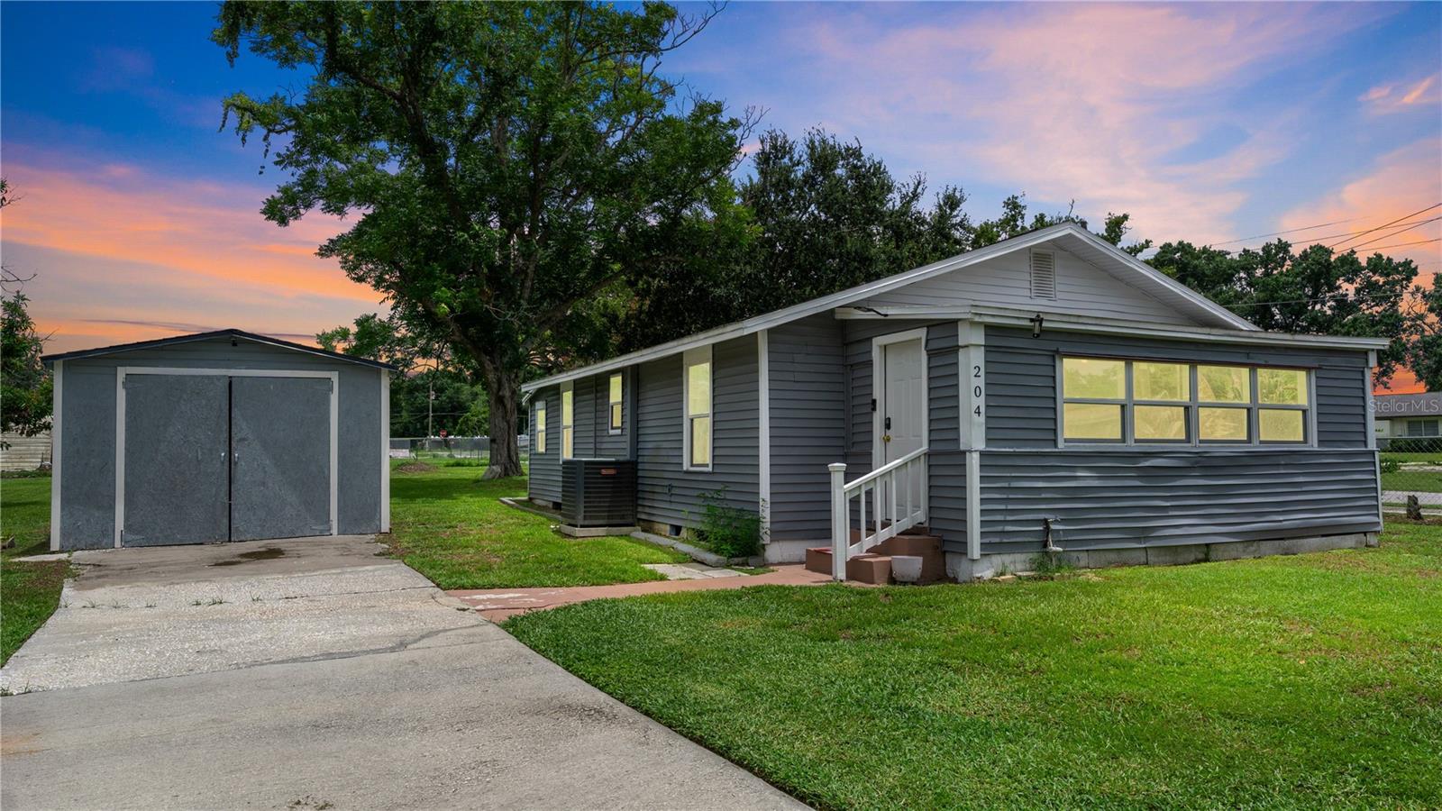 Welcome to this charming and exceptionally well-maintained 2-bedroom, 1-bathroom home nestled on a generous 0.43-acre lot in beautiful Polk County. Offering the perfect blend of comfort, privacy, and space, this hidden gem is ideal for first-time homebuyers, downsizers, investors, or anyone looking to enjoy the freedom of owning a property with NO HOA. From the moment you arrive, you'll appreciate the pride of ownership and the care that has gone into maintaining this home. The inviting interior features a functional floor plan filled with natural light, comfortable living spaces, and a warm, welcoming atmosphere that makes you feel right at home. The bedrooms provide ample space for relaxation, while the thoughtfully designed layout maximizes every square foot. Step outside and discover one of this property's greatest highlights—its expansive 0.43-acre lot. Whether you dream of creating a beautiful garden, adding a workshop, storing your boat or RV, entertaining family and friends, or simply enjoying the peace and privacy of a large backyard, this property offers endless possibilities. With no HOA restrictions, you'll have the flexibility to truly make this property your own. Conveniently located in the heart of Polk County, this home offers the tranquility of country-style living while remaining just a short drive from shopping, restaurants, schools, medical facilities, and major highways for an easy commute to Orlando, Tampa, and surrounding Central Florida attractions. If you're searching for a move-in-ready home with land, privacy, and unlimited potential, this is an opportunity you won't want to miss. Schedule your private showing today and discover why this well-maintained Polk County gem is the perfect place to call home!