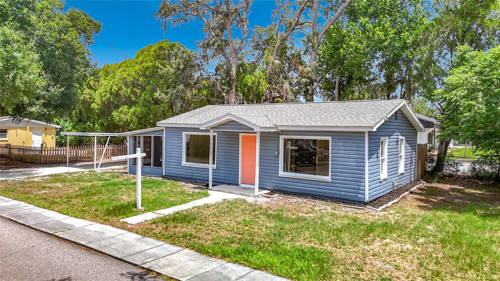 Affordable and move in ready!! Welcome to this charming and adorable 2 bed, 1 bath single family home with attached carport and lanai. The property is centrally located very close to downtown New Port Richey. This residence features a bright, open floor plan enhanced by large windows that fill the space with natural light. Roof 2022. Water heater 2023. Central air and new ducts 2023. Exterior paint 2023. Plumbing and electric in great condition. Tile throughout. Carport parking. No HOA and not in a flood zone. Zone X. Just a short ride to booming downtown New Port Richey, beaches, shopping and the airport. Be sure to schedule your showing today!