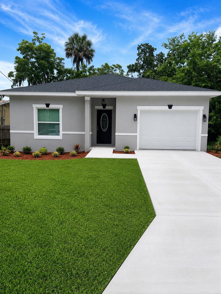 Brand-New Coastal Living in Daytona Beach!

Be the first to call this stunning newly constructed home your own! Completed in 2026, this beautifully designed 3-bedroom, 2-bath residence offers 1,078 square feet of thoughtfully crafted living space and is located just minutes from the world-famous beaches of Daytona Beach.

Step inside to discover a bright, open-concept floor plan featuring luxury vinyl plank flooring, designer lighting, and a spacious kitchen that serves as the heart of the home. The kitchen showcases elegant quartz countertops with dramatic veining, shaker-style cabinetry, stainless steel appliances, subway tile backsplash, and a large center island perfect for entertaining or casual dining.

Both bathrooms feature upscale finishes rarely found at this price point, including floor-to-ceiling marble-inspired tile, modern fixtures, quartz countertops, and a luxurious walk-in glass shower in the primary bath.

Enjoy peace of mind knowing everything is brand new—from the roof and HVAC system to the appliances and finishes. The home also includes a 1-car garage, energy-efficient construction, and low-maintenance living.

Conveniently located near shopping, dining, schools, and entertainment, this move-in-ready home combines modern style, quality craftsmanship, and an unbeatable location close to the beach.

Highlights:

New Construction (Completed 2026)
3 Bedrooms | 2 Bathrooms
1,078 Living Sq. Ft.
1-Car Garage
Quartz Countertops Throughout
Stainless Steel Appliances
Luxury Vinyl Plank Flooring
Designer Tile Bathrooms
Open Concept Layout
Minutes to Daytona Beach

Don't miss this opportunity to own a brand-new home in one of Florida's most desirable coastal communities! Schedule your private showing today.

Some photos have been digitally enhanced for quality assurance.