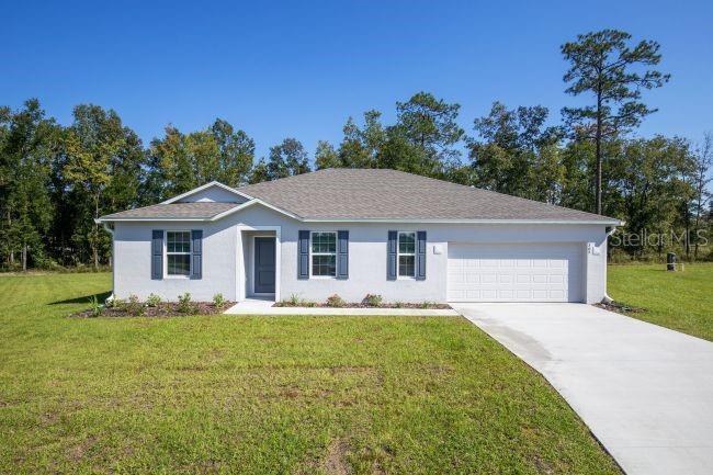 Pre-Construction. To be built. Experience the Willow floor plan in Edgewater, a waterfront community along the tranquil Indian River that is known as the locals' choice for Florida's East Coast beaches. Celebrated for its relaxed atmosphere, scenic parks, nature trails, waterfront dining, local boutiques, and year round community events, Edgewater blends coastal charm with abundant natural beauty.

Spanning more than 2,000 square feet, this thoughtfully designed home combines modern style with everyday comfort. A striking contemporary 3 lite front door welcomes you into a bright foyer filled with natural light, where upgraded rectangular ceramic tile flooring in rich dark gray hues extends throughout the main living areas, complemented by carpet in the bedrooms. The popular split bedroom layout features four secondary bedrooms positioned at the front of the home, providing flexibility for a variety of living needs.

At the heart of the home, the spacious great room connects effortlessly to the beautifully appointed kitchen, highlighted by a large center island with bar seating, upgraded granite countertops, soft close dovetail gray shaker cabinetry, a generous walk in pantry, and matching granite countertops in every bathroom.

Privately situated at the rear of the home, the spacious primary suite creates a peaceful retreat with a large walk in closet and a beautifully appointed ensuite bath featuring an oversized tiled walk in shower with a glass enclosure.

The laundry room is conveniently tucked behind the kitchen, providing everyday functionality while remaining out of the main living areas.

Outside, enjoy the patio, professionally landscaped yard, irrigation for the front and side landscaping using city water, durable architectural shingles, and energy efficient low emissive windows. Smart home features include a video doorbell camera, WiFi enabled thermostat, electronic front door lock, and WiFi enabled garage door opener. A full builder warranty provides added peace of mind.