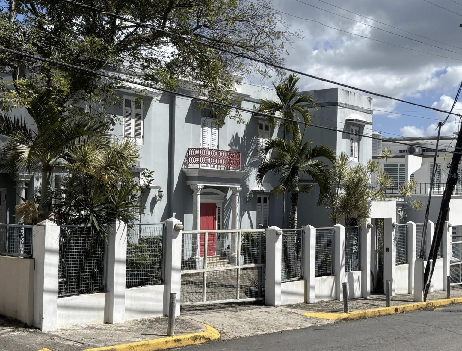 Elegant French/Mediterranean Neo-Classic Villa in Sagrado Corazon Historic District.
If you want a trophy-house the Santurce Arts District designed for entertaining - you have to see this villa! It is a FIXER-UPPER, but the owner is currently living there, so buyers can occupy while making renovations.
However, elements like the pool, spa, elevator, air conditioners are not functional and obsolete - so new owners will need to renovate many areas. Generator is functional but dated.
Kitchen is functional except Sub-Zero refrigerator (needs recharge).
This house was built in the 1940's and fully renovated in the 1990's to create an urban villa that will remind you of  the French Rivera or a classic Hollywood mansion. New owners will want to renovate and bring the house up to date for their own lifestyle while maintaining the glamour and elegance of the original design.
Located at 503 Calle Barbé (bar-bay) - one of Santurce's 'hidden secrets' behind Santurce Medical Mall. Neighbors feature renovated Art Deco 'Streamliner' houses and classic homes from the 1930's-60's. Easy access to everything in San Juan by car and excellent public transportation. One block from the campus and facilities of Sagrado Corazon University.

First Floor: Entry foyer with elegant marble/granite staircase and elevator leading to the upper landing/gallery. To the left is the formal living room that leads to a large 'bonus room' with separate handicap-access entrance that would be a perfect office, family room, den or party space since it opens to the pool and terrace at the back of the house.  First floor also has a formal dining room, pantry, half bathroom, laundry room, kitchen and raised breakfast nook with skylight that opens to the rear gardens. This could easily be modified to a very contemporary open design while retaining classic style. Marble floors throughout the main house.
Second Floor: The upper gallery/landing has the elevator and large primary bedroom with access to a large open terrace. A unique red marble bathroom with two separate sinks, two separate WCs, soaking tub, separate shower and separate bidet.  Bathroom opens to your walk-in closet.  Utility/office/closet area opens into large second bedroom. 
The primary bathroom now is a 'double Jack and Jill' configuration, but could easily be converted into two ensuite bathrooms which would provide two master-suites on the upper floor.
Attached garage has separate driveway in addition to the 'horseshoe driveway' to the front door.  A separate detached 'casita' at the back of the property has its own full bathroom. 
Exterior: Swimming Pool, Jacuzzi, Cascading Wall Fountain, Trellis Promenade, gardens and fountains have been neglected but can be restored to your own lifestyle and taste. They are currently not usable without renovation. 
Front of the house has a gated 'horseshoe driveway' for additional parking or guest arrival.
Alternate Utilities: Diesel Generator is not functional - at the back of the garage with exterior access - can be replaced with Diesel or LPG generator in the same dedicated space. Existing cisten is functional but outdated. Excellent potential for future solar panels on the roof which received direct sun all day.
If you want a move-in, 'turn-key' home - this is not right for you.  But if you are interested in bringing one of Santurce's legendary homes back to its former glory with modern amenities and features - this could be the perfect project for you!