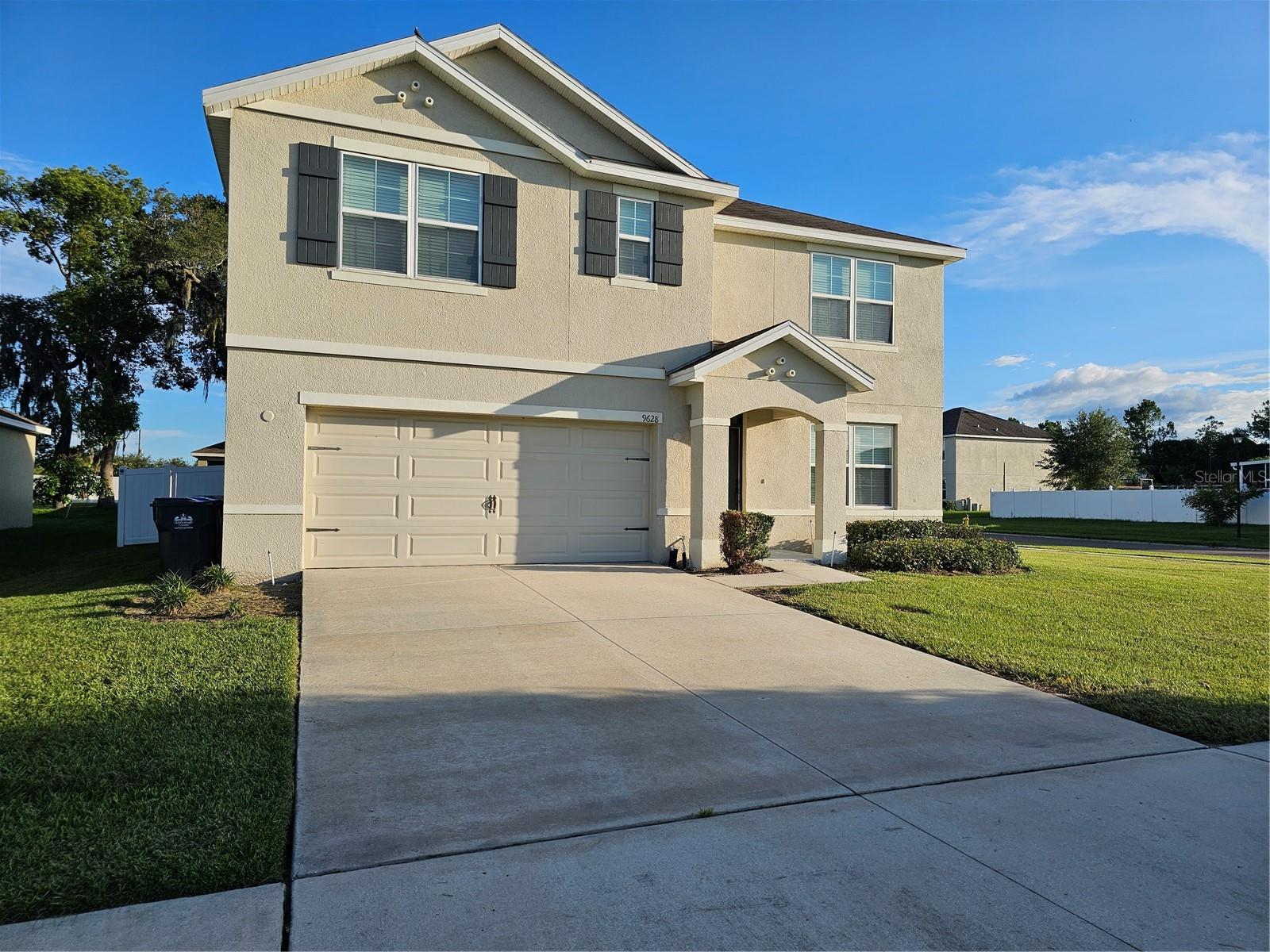 Luxurious Living in the Gated Enclave of Grand Oak Glen
5 Bedrooms + Loft | 3 Full Bathrooms | Gated Community | Thonotosassa, FL

Experience the perfect blend of privacy, comfort, and modern style in this stunning two-story residence. Situated on a large (60x135), fully fenced corner lot, this home offers a premium layout designed for both high-end entertaining and effortless daily living. A grand foyer leads to a versatile flex room, ideal for a formal living room, elegant dining area, or executive home office. Kitchen features sleek granite countertops, a center island with a breakfast bar, a walk-in pantry, and a sun-drenched eat-in area that opens to the fenced backyard. Enjoy a carpet-free lifestyle with luxury vinyl plank (LVP) in the family room, stairs and all bedrooms. Ceramic tile in the kitchen all wet areas. The spacious upstairs loft provides a secondary family room, media center, or play space. One full bedroom and bathroom are located on the main level, perfect for guests, while the remaining four bedrooms and laundry room are located upstairs for maximum privacy. 
The primary bed room is spacious and serene with LVP and en-suite bath room features separate "his and her" vanities and a large step-in shower and two separate walk-in closets. A massive, fully fenced backyard with peaceful pond views and plenty of room for entertaining.
Access to the private community pool, complete with lounging areas and professional landscaping. Minutes from I-75, I-4, 301, premier shopping, dining, and entertainment making commutes to Tampa or Orlando a breeze. Includes all kitchen appliances, window blinds, and ceiling fans in every room. Don't miss the opportunity to call this beautiful property home! Schedule your private tour today.