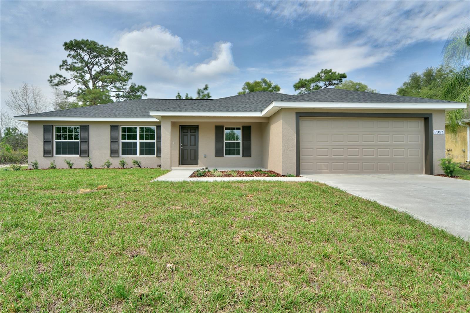 Under Construction. This Beautiful Banyan B Model is a  4/2 Split Bedroom Plan, the 4th Bedroom could be an office, den etc. You enter into an Open floor plan w/Cathedral ceilings, a separate Dining Area and Spacious Kitchen w/a large eat at Island. The solid wood cabinets w/soft close doors & drawers, Granite countertops, SS dishwasher, range & microwave, undermount sink make this a Dream Kitchen and perfect for entertaining. The home features Luxury Vinyl Planking throughout expect in the bathrooms and laundry room where the flooring is tiled all for easy clean up.  The private Master Bedroom boasts trey ceilings, ceiling fan,  walk in closet, & en-suite bath. The Master Bath has the same granite as the kitchen and guest bath & the same solid wood cabinets w/the soft close doors and drawers for the cabinets and a large tiled shower w/glass enclosure. The guest wing of the home has 3 bedrooms and a guest bath W/solid wood cabinet, granite & tub/Shower combo. The home has an inside laundry, in the wall pest defense system, easy to clean tilt inside windows, garage door opener that is WIFI ready.  Hurry and make an appointment to see this home and make it your own !