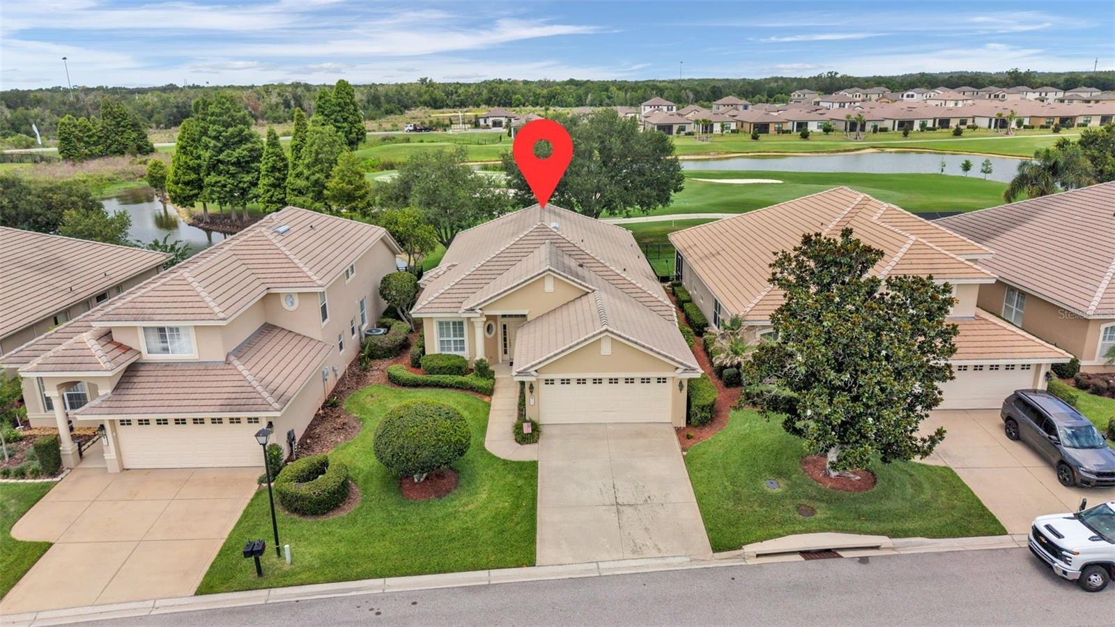Welcome to Turnberry at Grasslands Golf & Country Club! This beautifully maintained home offers 3 bedrooms, 2 bathrooms, plus an additional bonus room, providing flexible space for a home office, den, hobby room, guest room, or additional living area. Enjoy peaceful golf course views from the screened patio in one of Lakeland’s most desirable gated golf communities.
A brand-new tile roof will be installed prior to closing, offering added value and peace of mind for the future homeowner. Additional updates include fresh interior paint completed just days ago, a water heater replaced in 2022, and an A/C system replaced in 2018. The home features a desirable split-bedroom floor plan that provides added privacy for owners and guests. Inside, you'll find plantation shutters, crown molding throughout the main living areas and primary bedroom, and an inviting layout designed for both comfortable everyday living and entertaining.
The kitchen offers an eat-in dining area, walk-in pantry, and ceramic tile flooring. Ceramic tile is also featured in the bathrooms and hallway. Beautiful wood flooring flows through the living room, dining room, and bonus room areas, while the bedrooms feature carpet flooring.
The spacious primary suite includes a large walk-in closet and an en-suite bathroom with double sinks and a relaxing jetted tub. The guest bathroom also offers double sinks for added convenience.
The monthly HOA fee includes exceptional maintenance and community services such as exterior painting every 6 years, exterior cleaning every 3 years, roof cleaning every 2 years, monthly irrigation checks, mowing, edging, weeding, trimming under 12 feet, 24/7 gate attendants, common area landscaping and irrigation maintenance, street lighting, fountain maintenance, pond maintenance, an onsite licensed manager, management fees, reserves, and more.
Located within the Grasslands Golf & Country Club community, residents enjoy beautifully maintained surroundings, scenic views, and convenient access to shopping, dining, medical facilities, and major roadways. Don't miss this opportunity to enjoy maintenance-free living with beautiful golf course views!