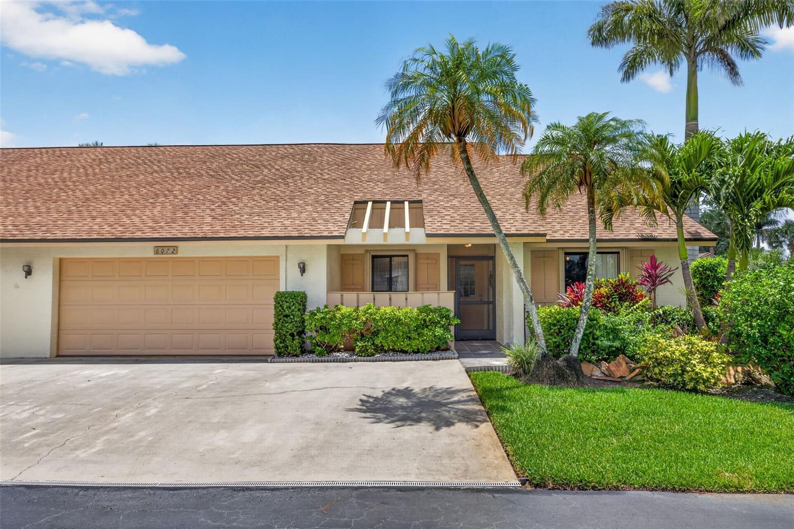 Welcome to Huntington Woods — a hidden gem in Naples. This well-maintained end-unit villa offers 2 bedrooms, 2 full bathrooms, and an inviting open-concept layout filled with charm and functionality.
The spacious living room features vaulted ceilings and a striking spiral staircase leading to a versatile loft area, perfect for a home office, den, or potential 3rd bedroom. The loft also includes a private balcony with sliding glass doors, ideal for enjoying fresh air and peaceful views.
The kitchen is designed for both convenience and entertaining, complete with an electric cooktop with griddle, prep sink, breakfast nook, and seamless flow into the dining and living areas. Step outside to the screened-in lanai and take in the beauty of the backyard setting.
The primary suite offers a relaxing retreat with an en-suite bathroom featuring dual sinks, dual shower heads in the tiled shower, and a spacious walk-in closet. Split-bedroom floorplan provides added privacy for guests, along with a full hall bathroom and conveniently located laundry closet.
Additional highlights include:
Plenty of storage throughout
Large 2-car garage with door opener
3 additional parking spaces in front of the home
Welcoming front porch for relaxing outdoors
Residents of Huntington Woods enjoy access to community amenities including an in-ground pool, pool house, and lounge seating. This quiet, private community features beautifully maintained landscaping, an irrigated lawn system, streetlights, and convenient direct access to both Santa Barbara Blvd and Rattlesnake Hammock Road.  Located in the heart of the desirable 34112 zip code, this home offers the perfect blend of privacy, convenience, and the Naples lifestyle. Residents enjoy easy access to downtown Naples, beautiful Gulf beaches, golf courses, shopping, dining, and everyday essentials, making it easy to enjoy everything Southwest Florida has to offer while still coming home to a peaceful community atmosphere. New/Updated Roof 2025/AC 2026/Microwave 2026/ Disposal 2021/Wash-Dryer 2016/Refrigerator 2019/HWH 2017.