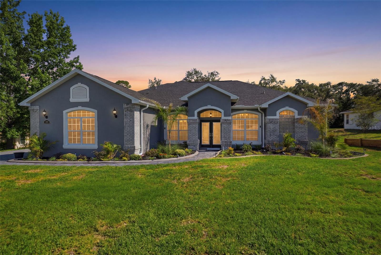 Welcome home to this spacious 5-bedroom, 3-bathroom home with a 2-car garage, situated on a beautifully manicured over half-acre lot. Designed with comfort and functionality in mind, this home features an open floor plan, 10-foot ceilings, elegant tray ceilings, and an abundance of natural light throughout.
The recently enclosed sunroom offers year-round enjoyment and includes automatic shades for added convenience. A separate formal dining room provides the perfect setting for family gatherings and entertaining.
One of the home's standout features is its thoughtfully designed layout, offering a private living area ideal for a teenager seeking their own space or an excellent mother-in-law suite arrangement.
Step outside and enjoy the expansive, manicured yard, sprinkler system complete with an invisible pet fence, a solar powered shed, and additional storage space for lawn equipment and outdoor essentials.
Major updates provide peace of mind, including a roof installed approximately 4 years ago, a 4-ton HVAC system installed in 2023 serving the main portion of the home, and a 3-ton HVAC system installed in 2026 serving the rear of the home. The property also features a new drainfield and a 50-gallon Smart High-Efficiency Hybrid Water Heater with a 10-year warranty.
Offering space, flexibility, energy-efficient features, and thoughtful updates throughout, this property is perfect for multi-generational living, growing families, or anyone seeking room to spread out while still being close to everyday conveniences.
This is truly a must-see home! The home is about an hour from downtown Tampa, making it convenient for commuters while still offering the space and privacy of a larger homesite. "Home had remediation in 2012, fully insurable
Buyers are responsible for verifying all measurements, square footage, and any information deemed important to their purchase decision.