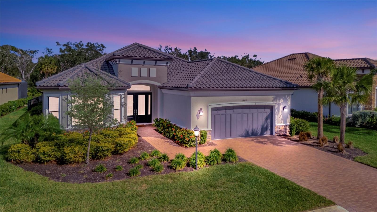 Florida luxury living at its finest! This stunning 3 bed/3 bath home is located on a conservation lot with a fenced back yard in the desirable community of Esplanade at Azario Lake offering a blend of comfort, style and luxury. This beautiful Palazzio model is situated in a tranquil neighborhood with easy access to the area’s vibrant amenities, making it ideal for seeking both convenience and serene living. This well-maintained gated community boasts a spacious, open-concept layout that is perfect for both family living and entertainment.  As you enter the home, you are welcomed into a bright and airy foyer with soaring ceiling, large hurricane impact sliders and an abundance of natural light. The modern kitchen is a chef’s dream with top-of-the-line appliances, an extensive quartz island, gas cook top, walk-in pantry, and an abundance of storage making it ideal for meal preparation and entertainment.  The home includes a luxurious master suite with a huge walk-in closet and en-suite bathroom with an amazing shower.  All rooms are designed with high-end finishes, offering both functionality and style.  The den offers additional space with flexible options such as an office or creative space for hobbies. The home also includes a high-end water treatment system and all lighting was upgraded after closing. The home’s extended lanai provides a perfect space for relaxation and entertainment. The lanai is plumbed for an outdoor kitchen and wired for TV making it ideal for outdoor activities and enjoying Florida’s beautiful weather. The backyard is perfect for adding a pool. Living in Esplanade at Azario Lake offers residents access to world-class amenities such as golf, pickleball, tennis, Bahama bar, resort style pool, and a culinary arts building offering on-site world class dining. This home is not just a place to live, but an exceptional lifestyle to experience.