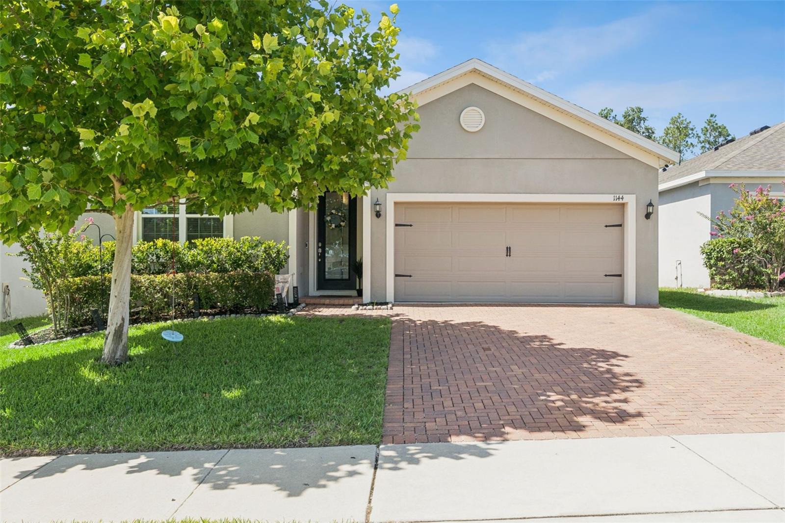 Welcome to this beautifully maintained Hanover Family Builders home, perfectly situated in one of Minneola's most desirable communities! From the attractive brick paver driveway to the fully fenced backyard, this home offers the perfect blend of style, comfort, and convenience.
Inside, you'll find an open and inviting floor plan featuring gorgeous quartz countertops throughout and a spacious kitchen designed for entertaining, complete with a large center island, abundant cabinetry, and seamless flow into the living and dining areas. An additional flex room provides endless possibilities as a home office, formal living room, playroom, or media space to fit your lifestyle.
Step outside to enjoy the privacy of the fenced backyard, perfect for pets, play, or relaxing evenings.
Residents enjoy exceptional community amenities, including a zero entry resort style pool with cabana, splash pad, shaded tot lot, dog park, and recreation area. Ideally located between historic Downtown Clermont and charming Downtown Winter Garden, you'll enjoy shopping, dining, farmers markets, and year round events just minutes away. Commuters will appreciate the home's close proximity to the new Minneola Turnpike Interchange, providing quick access throughout Central Florida.
Located within a highly sought after area with nearby "A" rated schools, this home truly offers the perfect combination of modern living, outstanding amenities, and an unbeatable location. Don't miss your opportunity to make this exceptional property your next home!