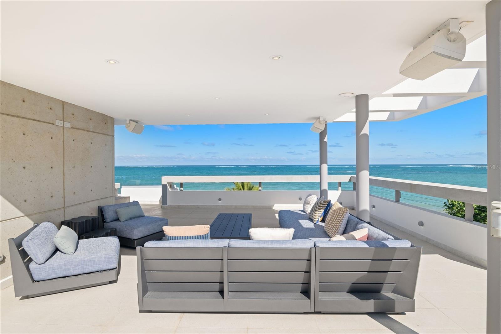 Stop scrolling/swiping/clicking around.  This is the ONLY move-in ready home in all of San Juan with views of the Atlantic Ocean.  And what views they are.... Everywhere to the north and northwest is water views, water views, and more water views.  Sunrises, sunsets, evening city views, fresh ocean breezes, and OH!  Mountain views from the roof terrace.  Just stop and book a showing now.

You want to know what's inside?  Only a stunningly decorated and crisp, modern home that is only missing your enjoyment to fill the space.  A spraaaawling roof terrace with jacuzzi is an (un)official Christie's Puerto Rico top 10 rated location to entertain/party/relax anywhere within 15 minutes of the airport.

This is a home that MUST be seen to be appreciated.  Kite surf, wind surf, fish, snorkel, paddleboard, tennis, running track, soccer, basketball, pickelball, and great dining are all either in front of your home or within 5 minutes walking.  Clear your afternoon and call today.