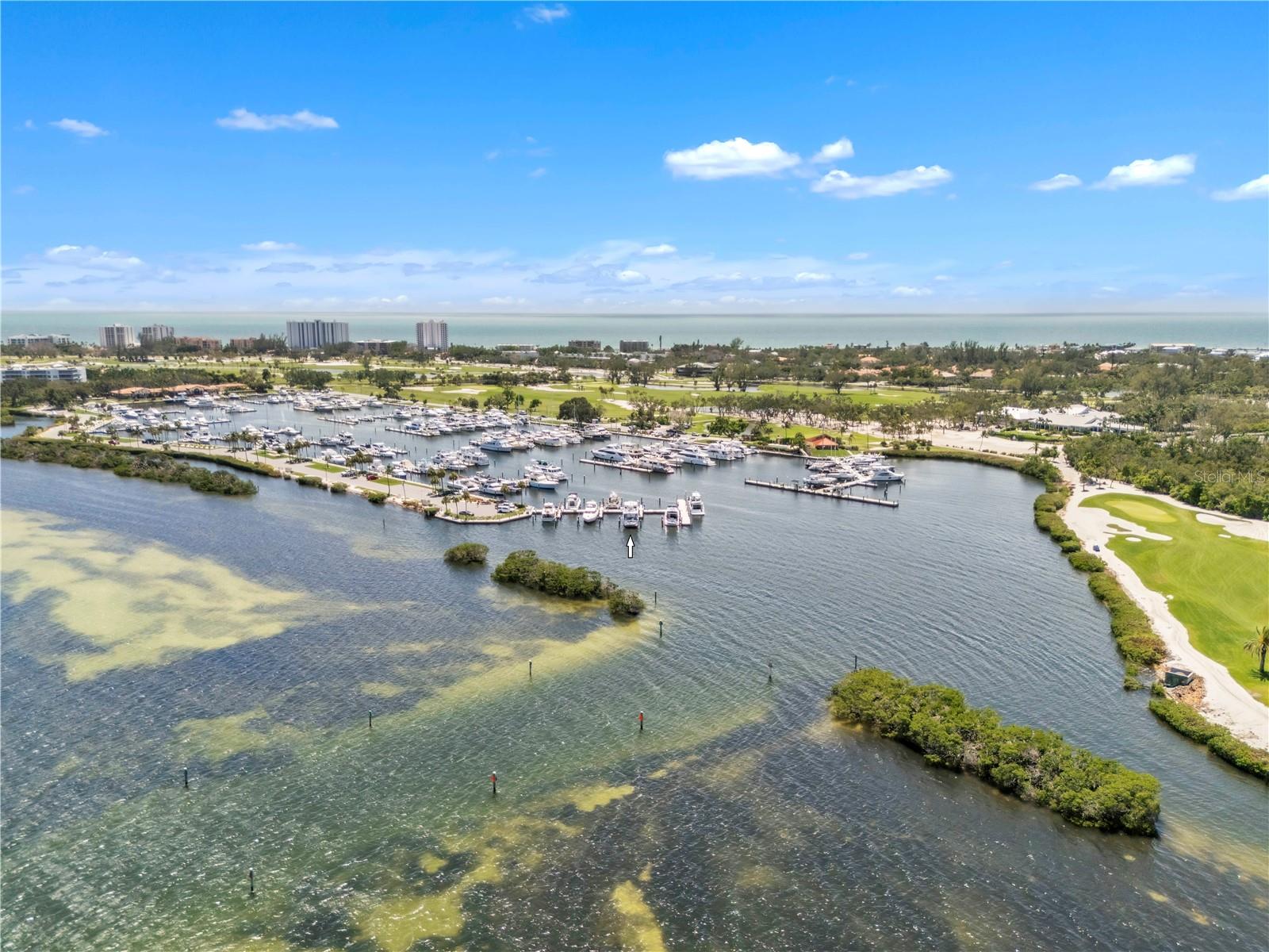 Embrace Unparalleled Elegance: Exquisite 75’ Boat Slip on Longboat Key’s premier R dock, Your Gateway to a Refined Gulf Coast Yachting Experience.

Discover the pinnacle of luxury boating with this stunning 75’ x 21’ deep water boat slip, perfectly situated on the spectacular R dock at Longboat Key Club Moorings Marina, nestled along Florida’s breathtaking Gulf Coast. Slip R-9 offers unrivaled views and the closest proximity to the inlet for effortless navigation, with serene waters and vibrant sunsets and the spectacular Sarasota sky line across the bay, as your backdrop—a gateway to an extraordinary yachting lifestyle. Located on Longboat Key, Slip R-9 provides direct access to the Intracoastal Waterway, ideal for deep-sea fishing or leisurely cruises. Enjoy upscale conveniences like Publix, CVS, Chase Bank, a post office, and public tennis courts just moments away. A complimentary shuttle connects you to the chic boutiques and gourmet dining of St. Armands Circle, while you can easily boat to iconic North Longboat Key restaurants like The Shore and Mar Vista, or nearby favorites like Chart House and Dry Dock Waterfront Grill, where fresh seafood and stunning views await. Longboat Key Club Moorings Marina is renowned for its elegance, offering high-speed Wi-Fi, water, laundry facilities, and pump-out services for a seamless experience, with pristine facilities and attentive staff catering to your every need. Visit by boat the nearby sandbars for leisurely afternoons in turquoise Gulf waters, or opt for membership to the Bay Isles Beach Club or Longboat Key Club for access to pristine, sandy beaches and world-class amenities. Unlike other slips, R-9 is not covenanted, meaning Longboat Key Club membership is optional, giving you the freedom to tailor your lifestyle with access to championship golf courses or the exclusive beach club at your discretion. Slip R-9 is more than a boat slip, it’s an invitation to a coastal lifestyle, with quick access to open waters, dining destinations like The Shore and Mar Vista, magical sandbars, and elite recreational opportunities. Own a piece of paradise in this A+ location, where every detail is designed for elegance and ease. Pursuant to condo rule this slip will accommodate a yacht with LOA of 70ft and 17ft beam and will be subject to association approval.