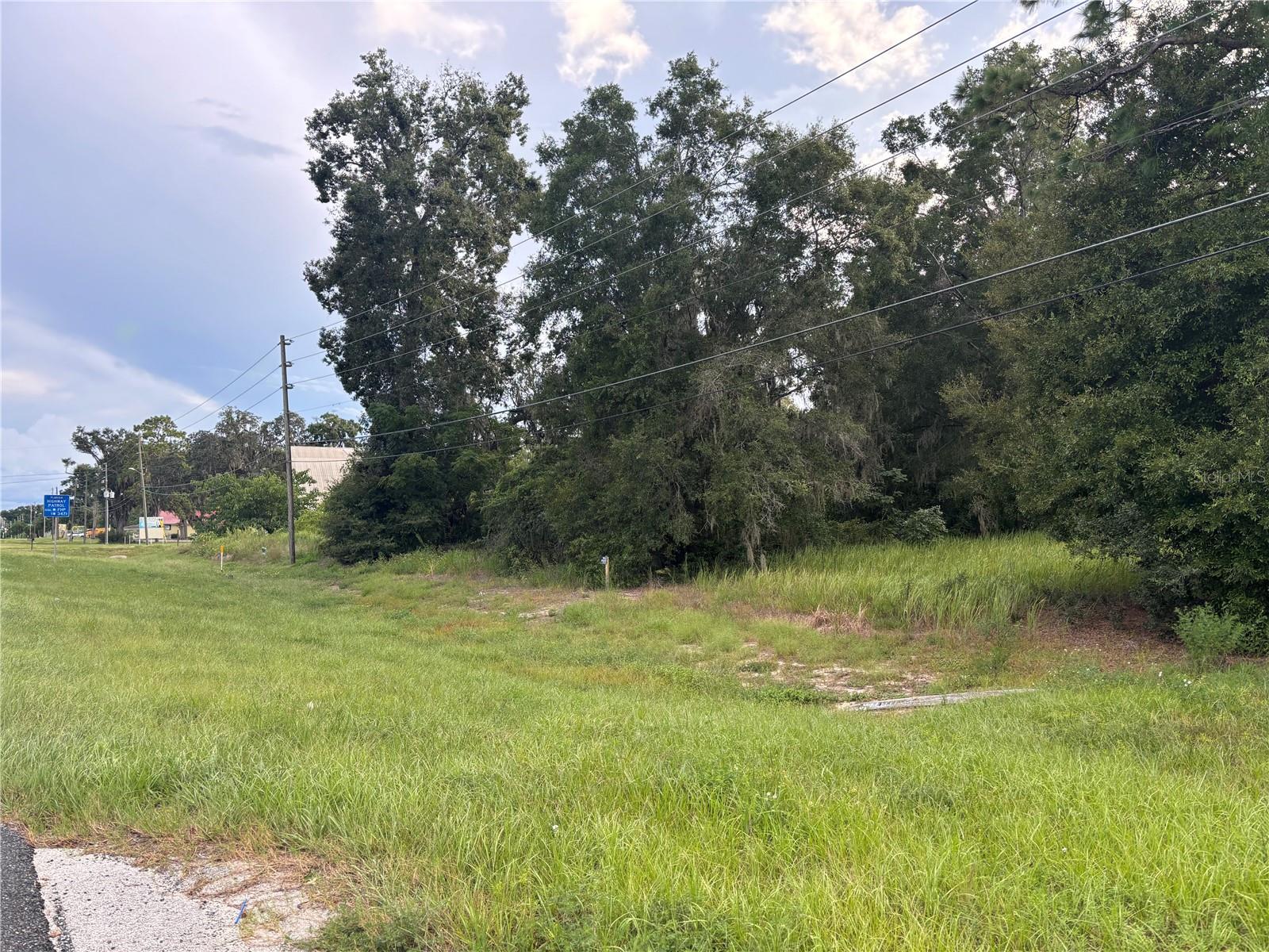 Prime commercial property on US HWY 301 in Belleview, Fla. This 2.08 acre property sits within the rapidly growing region of Ocala and Marion County. It sits right on HWY 301 between The Villages to the south, Downtown Ocala to the north, Wildwood and Summerfield. 2.08 acres of Commercial Zoned Land (B2) with a Commercial Use designated to it. Site can be accessed from residential neighborhood at the rear of the property as well. Its B2 Zoning allows for various land uses from a Self-Storage Facility, Restaurants, Bars, Banks, Hardware Stores, Drive-Throughs, Professional Offices, Car Parts Stores, Car Shops and a Shopping-Entertainment Center.