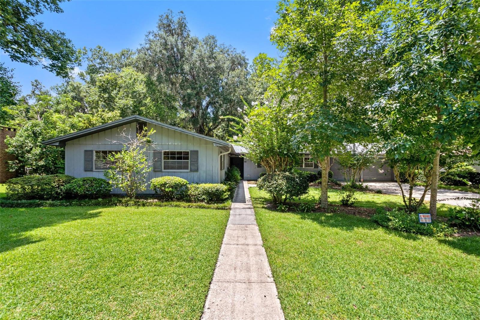 MOTIVATED SELLER!!  In the heart of Gainesville, this spacious 4 bedroom 2 bath home is situated in the sought after Brywood subdivision, offering a perfect blend of tranquility and convenience. New roof 2021 and new HVAC in 2021. House was recently appraised for $403,000. Nestled less than 2 miles from the prestigious University of Florida and surrounded by beauty of nature, backing up to woods and gentle creek. Enjoy the feeling of seclusion while being moments away from all the amenities Gainesville has to offer. Don't miss the opportunity to make this house your own.  Add your personal touches to this established home and a haven that suits your lifestyle.