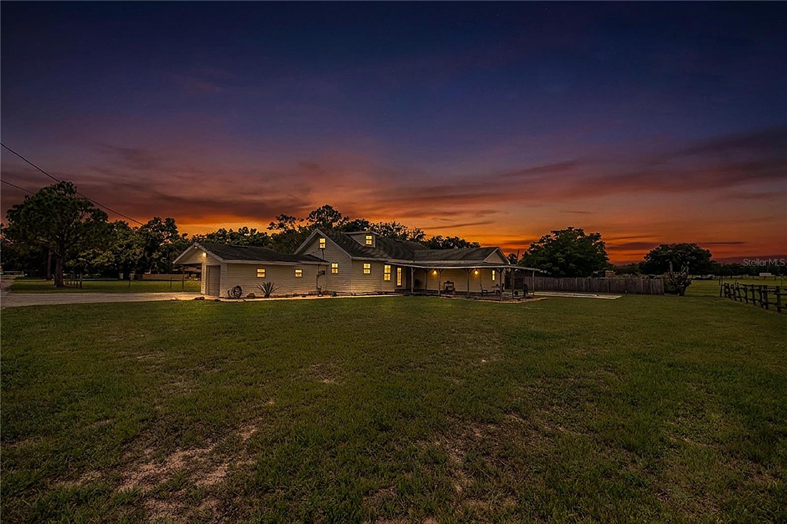 A peaceful and tranquil Florida farmhouse.

 This 4-bedroom, 2 1/2 bathroom offers the perfect blend of country charm and comfortable living.  Close to town and convenient for shopping and schools.  Adding to the appeal is a fully equipped 2-bedroom, 1-bath separate guest house, complete with spacious porches—an ideal spot to enjoy Florida sunrise and sunsets.

 Horse owners will appreciate the set-up of the 5-stall horse barn, designed with the comfort and well-being of the animals. The tack room provides ample room for feed, saddles and gear for all your needs.   

The main home welcomes you with a spacious front porch that wraps around to the inviting in-ground swimming pool, creating the perfect setting for enjoying the Florida sunshine, entertaining family and friends, or simply unwinding outdoors.

Whether you’re a horse lover looking for space for farm animals or simply seeking a peaceful country retreat, this 3.93-acre property offers you the opportunity to add your personal touches in making this property your own.

Also, this exceptional home comes with a full year home warranty including:
Air Conditioning System, Ceiling and Exhaust Fans, Clothes Dryer, Clothes Washer, Cooktop, Dishwasher, Drywall, Ductwork, Electrical System, Heating System,
Oven Stove Cooktop, Plumbing Stoppage, Plumbing System, Refrigerator, Water Heater, Whirlpool Bathtub Well Pump, Septic System, Pool / Spa