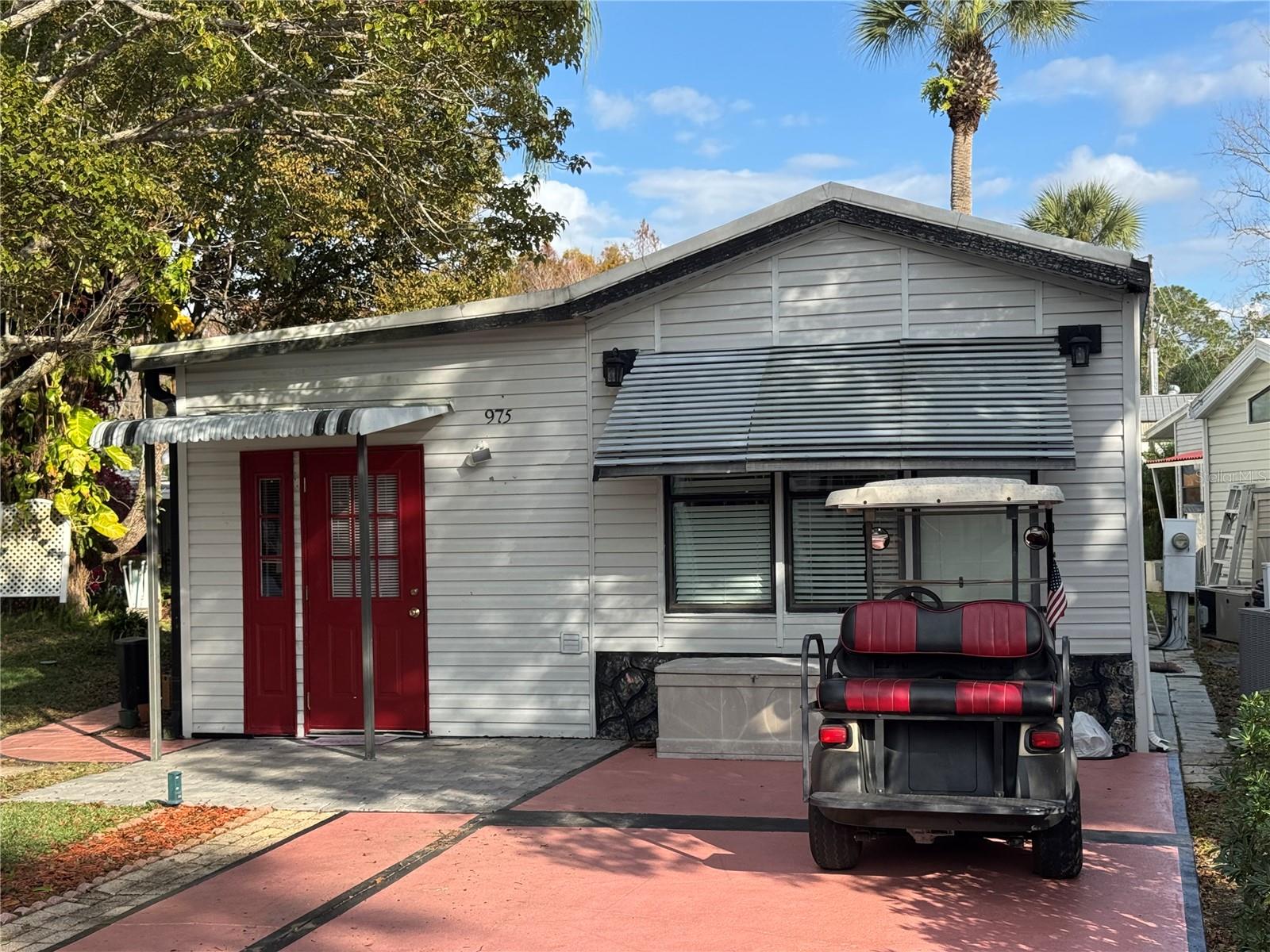 Get ready to enjoy your vacation paradise just minutes from the parks and amenities.  This house is situated on one of the largest lots in the entire neighborhood with room to garden and landscape.  Use this as a snowbird nest or a full time sunny residence.  Great community with tons of amenities and activities.  A real must see.. This neighborhood boast 2 large pools a nine hole par 3 golf course, docs available to rent and large clubhouse  This house is available to be left fully furnished with golf cart if desired