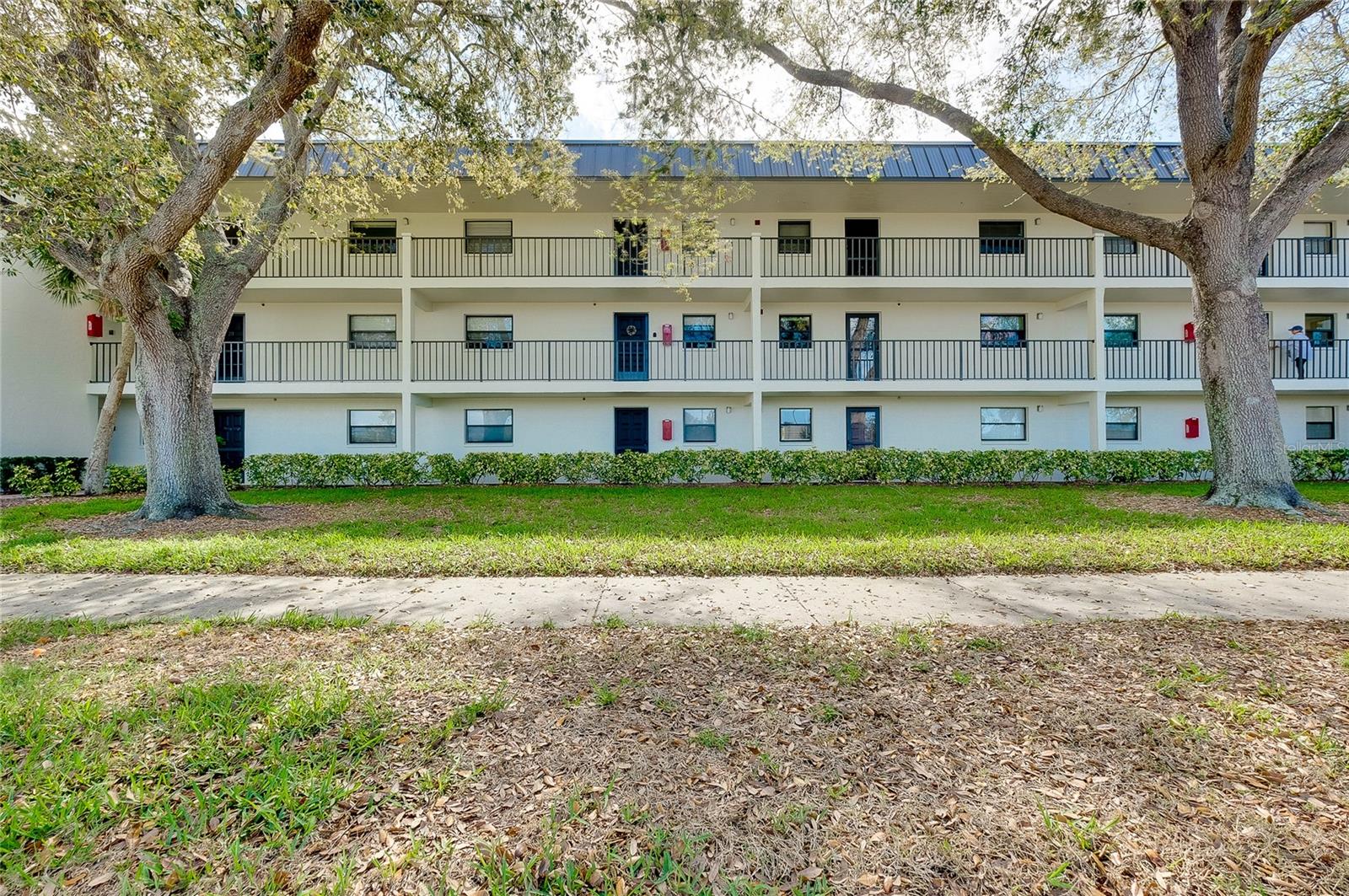 ~~ ANOTHER PRICE IMPROVENEBT ~ This beautifully updated second-floor unit showcases quality upgrades throughout. Porcelain tiles flow seamlessly through every room, including closets, complemented by textured ceilings, crown molding in the living and dining areas, and new interior doors with brushed nickel lever handles. Double-pane impact-resistant windows and a newer front door provide added peace of mind. French doors from both the living room and primary suite open to the lanai balcony, creating a bright, airy feel. The kitchen is thoughtfully designed with granite countertops, a breakfast bar, rich wood cabinetry, stainless steel appliances, a built-in cooktop, an upper microwave/convection oven, recessed lighting, and a tray ceiling with indirect crown-lit detail. The primary bath features a tiled step-in shower with a glass enclosure and an updated vanity with stylish fixtures and finishing touches, elevating this move-in-ready home. Enjoy community amenities including a heated pool, tennis court, BBQ area, and ample guest parking. Capri Isles and Waterford Golf Clubs are nearby, along with shopping, dining, medical facilities, and public transportation just steps away. Downtown Venice and a variety of restaurants are only minutes away. Assigned parking is located in the south lot. Strong rental potential makes this a smart investment. Schedule your private showing today and start living the relaxed, sun-soaked Venice lifestyle where beach days, golf outings, and waterfront dining are simply part of everyday life.