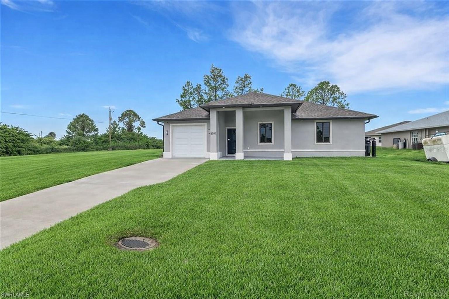 Virtually Staged. 4501 GENERATING INCOME BEGINNING MAY 1 FOR 1 YR LEASE.Use preferred lender and qualify for up to $17,000 toward closing costs and/or down payment assistance, subject to buyer qualification and program terms.
 Brand-new 2025 duplex located in the highly desirable southwest area of Lehigh Acres, perfectly situated near Sunshine Blvd, Gunnery Rd, and Lee Blvd, offering easy access to Fort Myers, shopping, dining, and schools. Each side of this beautifully designed property features 3 bedrooms, 2 bathrooms, and a 2-car garage with laundry, showcasing modern finishes, tile flooring throughout, impact-resistant windows, and an open-concept layout that creates a bright and spacious feel. The kitchens are equipped with sleek cabinetry and ample counter space, ideal for both everyday living and entertaining. Built with durable concrete block construction and a stylish stucco exterior, this duplex sits on an oversized 0.30-acre corner lot with separate entrances on each side for added privacy and convenience. Perfect for investors or homeowners looking to live on one side and rent out the other, this new construction property offers exceptional quality, modern design, and strong income potential in one of Lehigh Acres’ most rapidly developing areas.
