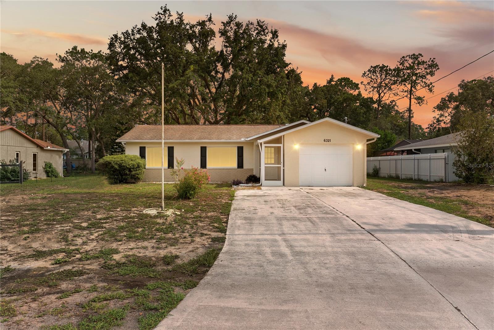 Motivated seller! This beautifully maintained 2-bedroom, 2-bath home features new vinyl flooring throughout, a new A/C (2025), updated ceiling lights, and a converted garage providing additional living space. Conveniently located near shopping, dining, medical facilities, and the Suncoast Parkway. Schedule your private showing today!