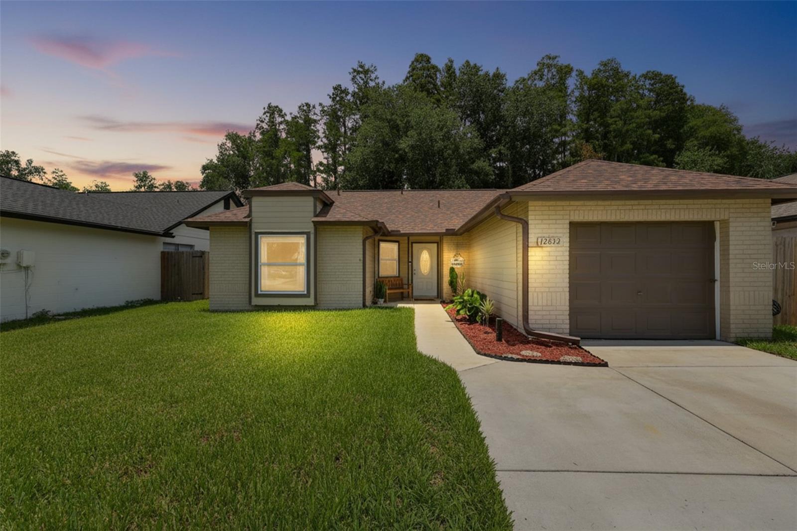 Seller offering $5,000 credit towards buyers' closing costs. Welcome to this beautifully updated 3-bedroom, 2-bathroom home in Tampa. Situated on a 4,500 sq. ft. homesite with an additional conservation easement behind the property, the total property footprint encompasses approximately 0.89 acres, creating the feel of a much larger backyard with no rear neighbors. 

Extensive renovations completed in 2022 provide modern style and peace of mind, including a fully remodeled kitchen featuring new cabinetry, countertops, fixtures, and stainless-steel appliances. Both bathrooms were fully updated, and additional interior improvements include new doors, molding, and trim throughout the home. 

Vaulted ceilings and large windows fill the main living area with abundant natural light, creating an open and spacious feel throughout the home.

Major system updates include updated plumbing completed in 2022, a roof installed in 2024, water heater approximately 4 years old, and A/C approximately 11 years old. The home also features a water softener and reverse osmosis system installed in 2022 for enhanced water quality.

A garage conversion adds valuable flexible living space ideal for a home office, gym, media room, or playroom.

Step outside to enjoy the low-maintenance artificial turf backyard installed approximately 3 years ago, a fully fenced yard, and a large covered patio/deck area perfect for entertaining, relaxing, or enjoying the peaceful conservation views.

With major updates already completed, this move-in-ready home offers comfort, style, and long-term value in a desirable Tampa location.