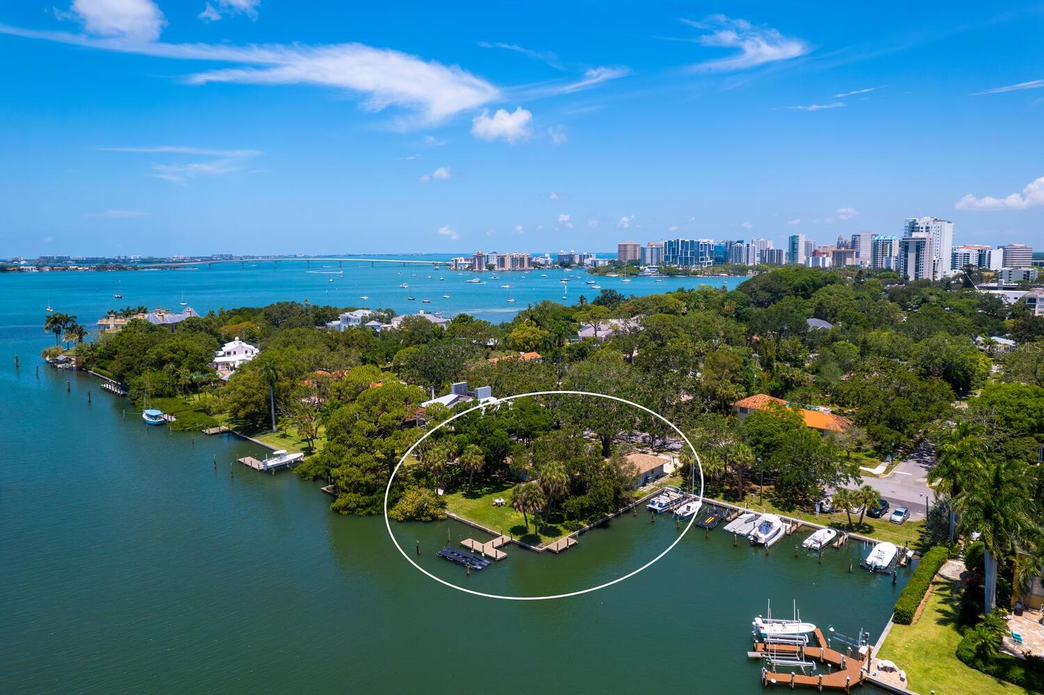 Available for the first time in over 40 years, discover the perfect canvas for your dream home on this exceptional waterfront lot, located in the highly sought-after neighborhood of Bay Point Park. Nestled along serene protected waters, this spacious parcel is surrounded by nearly 200 feet of water and offers an unparalleled opportunity to create your personal sanctuary with unobstructed panoramic views. Whether you envision a modern estate, a charming cottage, or a luxurious retreat, this lot provides the ideal setting to bring your vision to life. With direct water access and no bridges to the bay, enjoy two private dock possibilities, fishing, kayaking, and unforgettable sunsets right from your doorstep. The lot boasts 13,500 square feet and water on two sides, offering a perfect vantage point for picturesque views while maintaining privacy and seclusion. Located in a peaceful and highly desirable area, you will enjoy both tranquility and convenience, with close proximity to local amenities, shops, and dining. Just minutes to Marie Selby Botanical Gardens, downtown Sarasota, and Southside Village, enjoy the lifestyle that is unique to this neighborhood. Whether you are looking to build your primary residence or a vacation home this lot offers endless possibilities. Don't miss this opportunity to own a piece of prime waterfront real estate and start creating the lifestyle you have always dreamed of! Home was flooded during storm of 2024. Photos were taken prior to the storm.