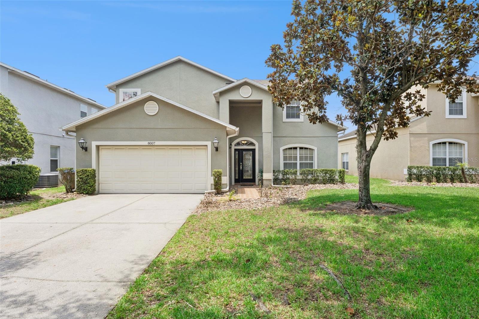 **This house comes with a REDUCED RATE through the seller's preferred lender. This is a lender-paid rate buydown that reduces the buyer's interest rate and monthly payment.**

Welcome to 8007 Acadia Estates Court in Kissimmee, A 6-bedroom, 6.5-bath home designed for comfortable everyday living.

This FULLY FURNISHED two-story residence offers a spacious layout with room to gather, relax, and entertain across multiple levels. The six-bedroom configuration provides flexibility for large households, guests, or a vacation-home setup, while the six full bathrooms and additional half bath add convenience throughout the home.

A dedicated theatre room creates a private setting for movie nights and game-day viewing, while the separate game room provides another space for recreation, entertaining, or a lounge area.

Outdoor living is designed for enjoying the Florida lifestyle, with a covered patio overlooking an in-ground pool and spa. The screened pool enclosure and surrounding deck offer room for sunbathing, outdoor dining, or relaxing poolside while keeping the area comfortable and usable year-round. Recent updates provide added value and peace of mind, including a new roof installed in 2021, a new HVAC system in 2023, pool resurfacing completed in 2024, and a new refrigerator added in 2026.

Located in the Acadia Estates area of Kissimmee, the home is close to dining, shopping, golf courses, and popular Central Florida attractions. The location offers convenient access to Walt Disney World, Celebration, ChampionsGate, and major roadways, making it an appealing option for buyers seeking a spacious home near the area’s entertainment and resort destinations.