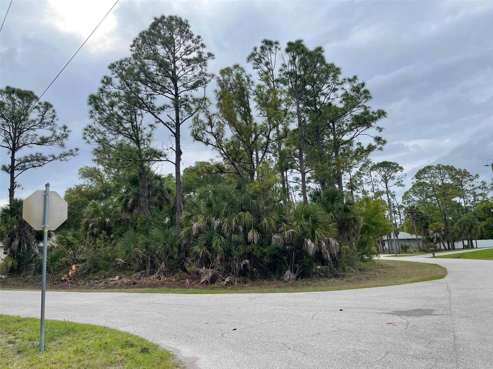 OVERSIZED CORNER LOT * 13,659 SF (.31 acres) * NOT in Flood Zone * NO HOA, CDD, Deed Restrictions, or Rental Restrictions. Easy and close access to I-75 and US 41.

*This lovely high and dry lot features many mature oak trees, as well as tall pines and palm trees. It is situated in a quiet neighborhood with beautiful, newer homes.  

*Young families will appreciate that the highly rated Atwater Elementary School is located just 1.2 miles away.

*Conveniently located near shopping, restaurants, North Port Water Park, Major League Baseball Spring Training Parks, and beautiful nearby beaches.

*Take advantage of this exceptional opportunity to build your perfect dream home in a lovely setting or as investment property for the future.