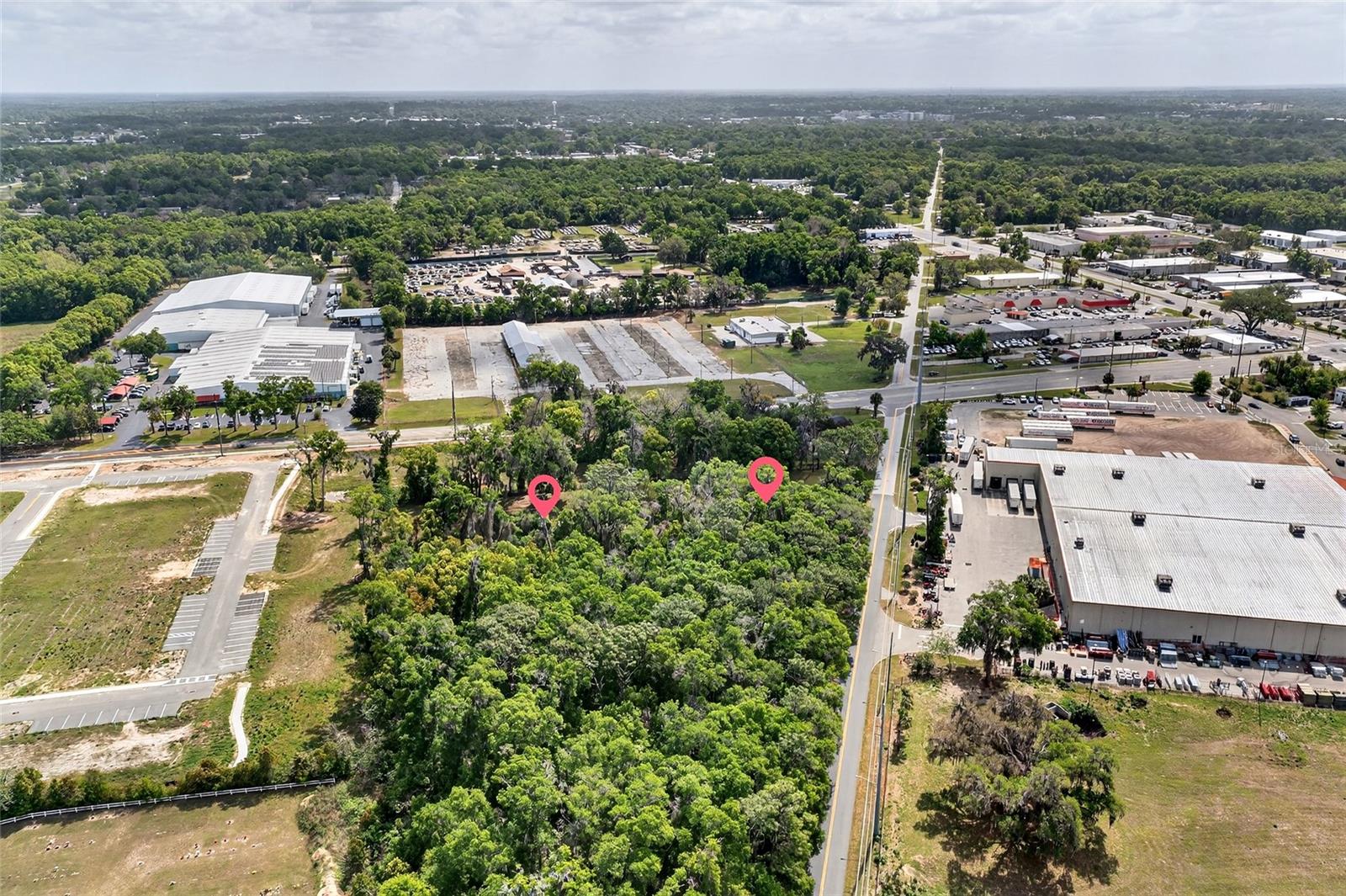 GREAT INVESTMENT OPPORTUNITY IN A RAPIDLY GROWING AREA!  LOCATION LOCATION LOCATION 
2 lots - Located in the heart of the CITY OF OCALA .      Lot#1 is .57   Lot #2 is .54 each  Totaling over 1.11 acres  MAKE THAT PASSIVE INCOME-  DUPLEXES ALLOWED!   Water & sewer are in place.  Water located in the NE protion of the lot.  Central Sewer is located in the West of the property .  Split zoning rear portion. R2. Front R1.   Can be combined or seperate.