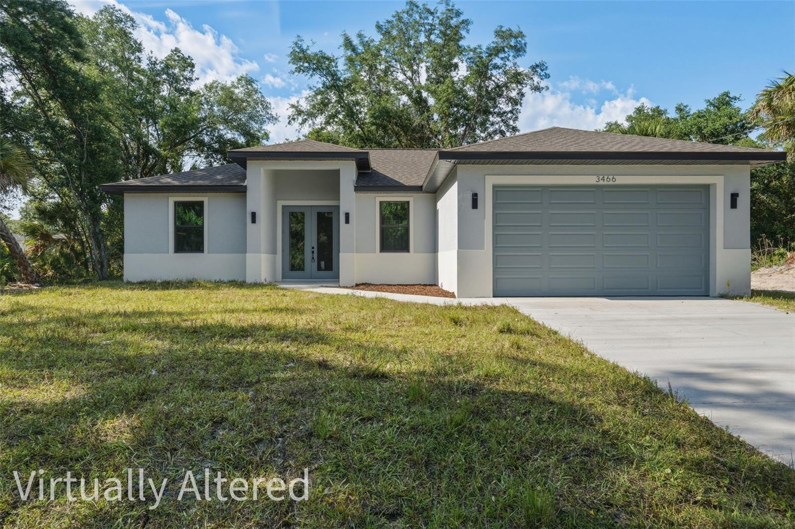 Welcome to a stunning example of modern luxury living in the highly desirable city of North Port. This brand-new 2026 fully custom-built MODEL HOME showcases exceptional craftsmanship, upscale finishes, and a thoughtfully designed layout that perfectly blends sophistication with everyday comfort. Spanning 1,650 square feet, this BEAUTIFUL 4-bedroom, 2-bathroom home features a bright open-concept floor plan highlighted by soaring 10’4” ceilings, elegant tray ceiling details, and oversized double glass entry doors that flood the interior with natural light. Throughout the home, impressive 32x32 porcelain tile flooring enhances the clean, contemporary aesthetic while creating a seamless flow from room to room. The designer kitchen serves as the centerpiece of the home, crafted to impress both visually and functionally. It features Level 4 quartz countertops with dramatic waterfall edges, full wood soft-close cabinetry, stylish pendant lighting, stainless steel appliances, a charming farmhouse sink, and decorative hardware accented with slick black trim, creating a space that feels both luxurious and welcoming. The expansive primary suite offers a true private retreat, complete with dual walk-in closets and a spa-inspired bathroom showcasing a floor-to-ceiling tiled shower with modern 64x12 tile, dual-sink vanity, and elegant designer mirrors and fixtures. Additional bedrooms are generously sized, while the fourth bedroom provides the perfect space for a home office, den, or flexible living area. Premium upgrades continue throughout the home and include: * Impact-rated front door and bronze impact windows * Electric fireplace * Whole-home water softener system * Full irrigation system * *Professional landscape package * Plus a worry free complimentary 10-YEAR HOME WARRANTY * Ideally situated in the growing community of North Port, the property offers convenient access to Interstate 75, HWY 41, the brand-new, soon-to-be-built state-of-the-art hospital, plus quick access to some of the area's finest shopping, dining, parks, schools, warm mineral springs and more. This exceptional new construction home combines modern luxury, high-end finishes, and a prime location—an outstanding opportunity to experience the very best of Florida living. So don't let your Florida dream home become someone else's address, set up your showing today! ** Be Sure To Check Out the Beautiful Fly Through Video of This Gorgeous Home **