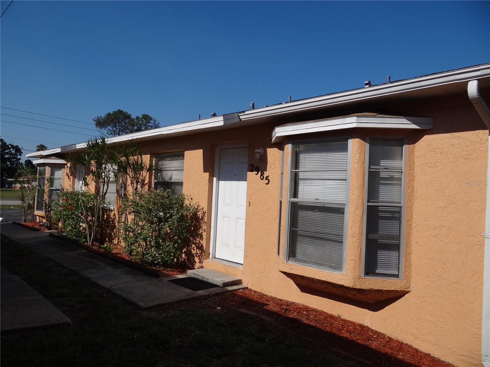 Excellent investment opportunity in the heart of St. Petersburg! This well-maintained concrete block duplex features two spacious units each offering 2 bedrooms and 2 bathrooms with porcelain tile and luxury vinyl flooring throughout. Both units include inside utility rooms with laundry and private yard spaces providing added comfort and convenience for tenants.

One unit is currently occupied by a reliable long-term tenant providing immediate income while the second unit is vacant ideal for an owner-occupant or an investor looking to lease at market rates. Rental income is currently below market with strong upside potential to approximately $2,150 per unit beginning August 1, 2026.

Tenants are responsible for electricity and water, with separately metered utilities helping keep operating expenses low and management simple. Built in 1984 the property is constructed of solid concrete block and offers ample on-site parking.

Ideally located between I-275 and US-19, this property provides convenient access to St. Petersburg, Tampa, and Clearwater. Situated in a non-flood zone (no flood insurance required) it offers additional long term value and peace of mind.

Enjoy a central location just minutes from Sawgrass Lake Park, Crescent Lake Park, and vibrant downtown St. Petersburg, including the St. Pete Pier, waterfront dining, museums, and shopping. A short drive to the Gulf beaches and convenient access to St. Pete–Clearwater International Airport and Tampa International Airport further enhance the appeal.

A rare opportunity to own a versatile, income-producing property in a high-demand rental area with strong long-term growth potential.

2983 UNIT IS TENANT OCCUPIED — PLEASE DO NOT DISTURB TENANTS- ONLY 2985 CAN BE SEEN.