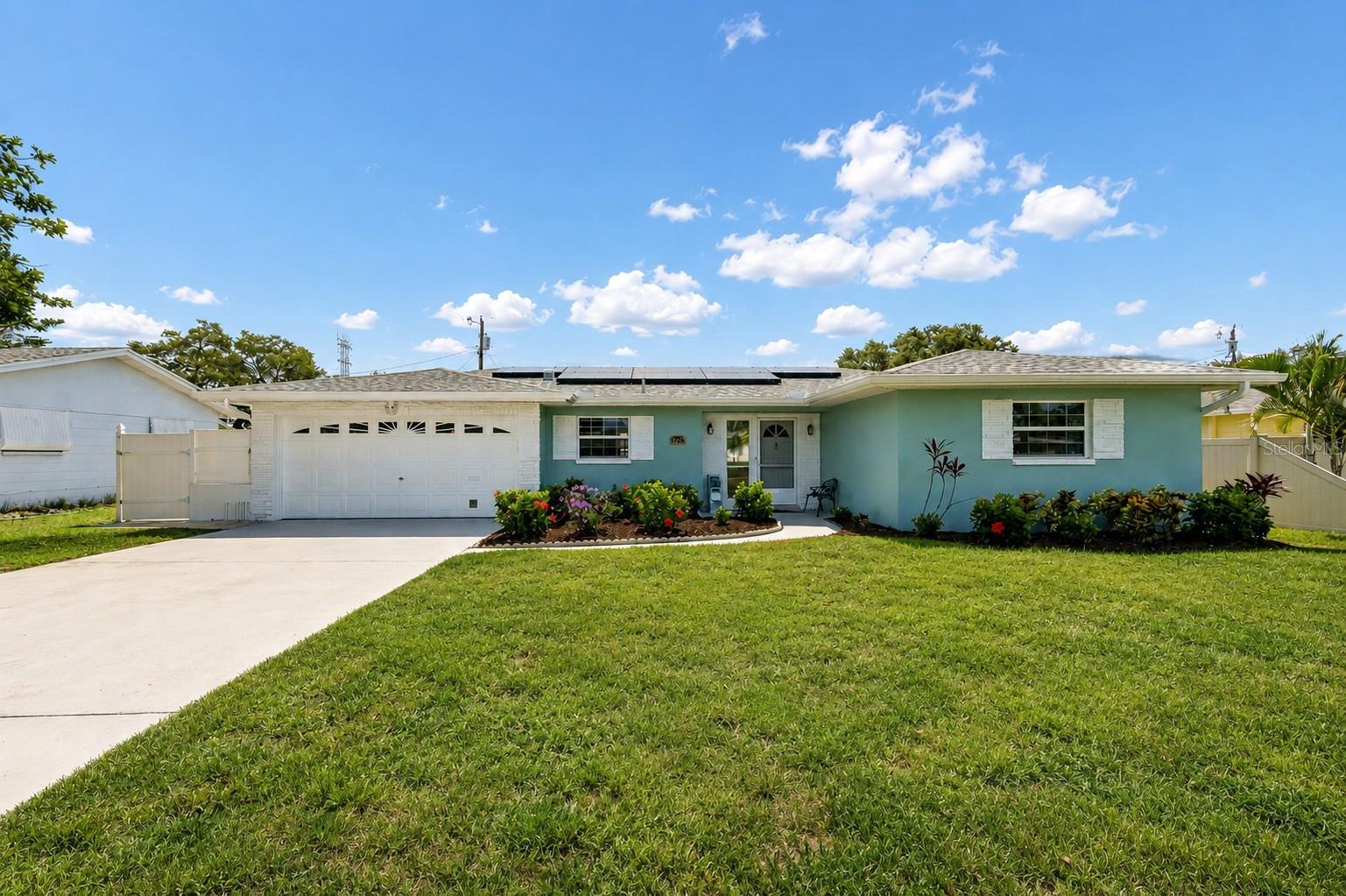 Welcome home to this beautifully maintained 3-bedroom, 2-bath, 2-car garage home in Clearwater, Florida, offering the perfect combination of modern updates, energy efficiency, and an unbeatable location. Whether you're a first-time homebuyer, downsizing, or looking for a move-in-ready Florida home, this property checks every box.

Inside, you'll find a bright, open floor plan with comfortable living spaces and a kitchen featuring newer stainless-steel appliances, making everyday living and entertaining effortless. The spacious 2-car garage provides plenty of room for vehicles, storage, or a workshop.

Step outside into your private backyard oasis featuring a fully vinyl-fenced yard, an expansive paver patio, a new retractable awning, and two storage sheds—perfect for entertaining, gardening, pets, or simply enjoying the Florida sunshine.

This home is designed to save you money with energy-efficient solar panels, helping reduce monthly electric bills. Additional updates include a new roof (2023) and fresh exterior paint, giving buyers peace of mind for years to come.

One of this home's biggest advantages is its exceptional location. Situated in a non-flood zone and non-evacuation zone, you'll enjoy added security while still being just minutes from everything that makes Clearwater one of Florida's most desirable places to live. Outdoor enthusiasts will love the direct neighborhood access to the Duke Energy Trail that connect to the Pinellas Trail, making it simple to explore all that Pinellas County has to offer.

Conveniently located near Clearwater Beach, Downtown Dunedin, Safety Harbor, Largo, Tampa International Airport, St. Pete-Clearwater International Airport, top-rated shopping, restaurants, medical facilities, parks, and major highways, this home offers the ideal Florida lifestyle with easy access to work, recreation, and the Gulf Coast.