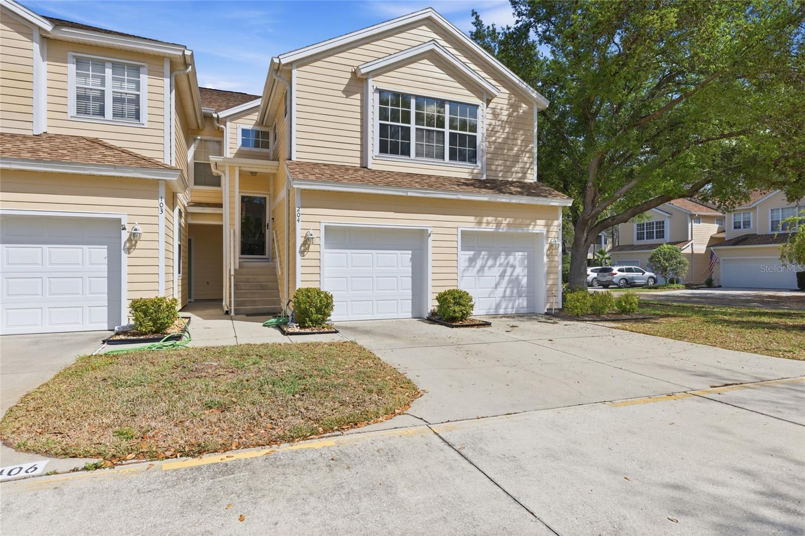 Move-in ready and beautifully maintained, this light-filled two-bedroom, two-bathroom condo features spacious, open living areas designed for comfortable everyday living. The updated kitchen offers both style and function, highlighted by a built-in butcher block cabinet that provides additional counter space and storage. Tile flooring runs throughout the main living areas, while both bedrooms feature new laminate flooring. The primary suite has been thoughtfully updated with a new shower, sliding glass doors, and tile extending all the way to the ceiling, along with a custom closet system for added organization. The guest bathroom has been refreshed with a new toilet, and ceiling fans are installed throughout the home. A hurricane-impact sliding door leading to the balcony and a glass storm front door add peace of mind. The connected one-car garage offers added convenience, with interior entry through a coat closet. Inside, a well-sized laundry room with additional storage makes daily living easy. Perfectly located in the heart of Lakewood Ranch, this home is walkable to the local school and just minutes from Waterside Place, Main Street, and The Market, as well as UTC’s shopping, dining, and entertainment. The area’s world-renowned Gulf Coast beaches are a short drive away, and both Sarasota and Tampa International Airports are easily accessible. With thoughtful updates, a functional layout, and an unbeatable location, this home offers the ideal combination of comfort and convenience.
